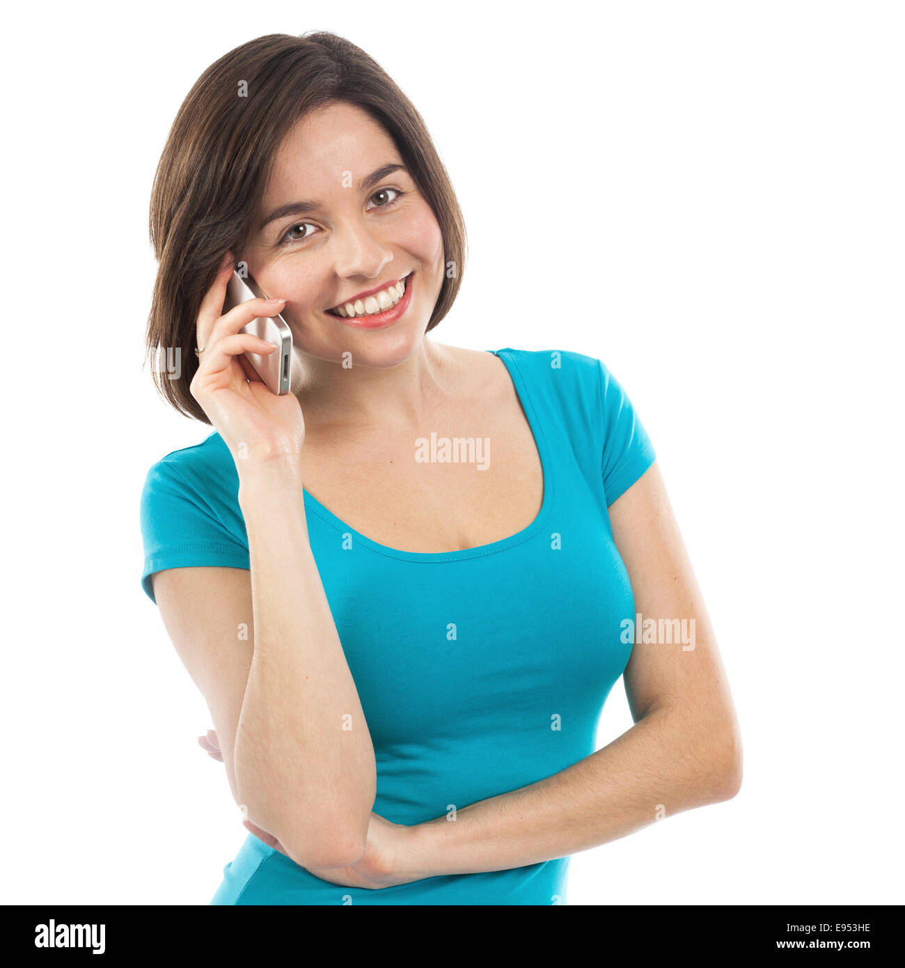 Schöne Brünette Gespräch am Telefon, isoliert auf weiss Stockfoto