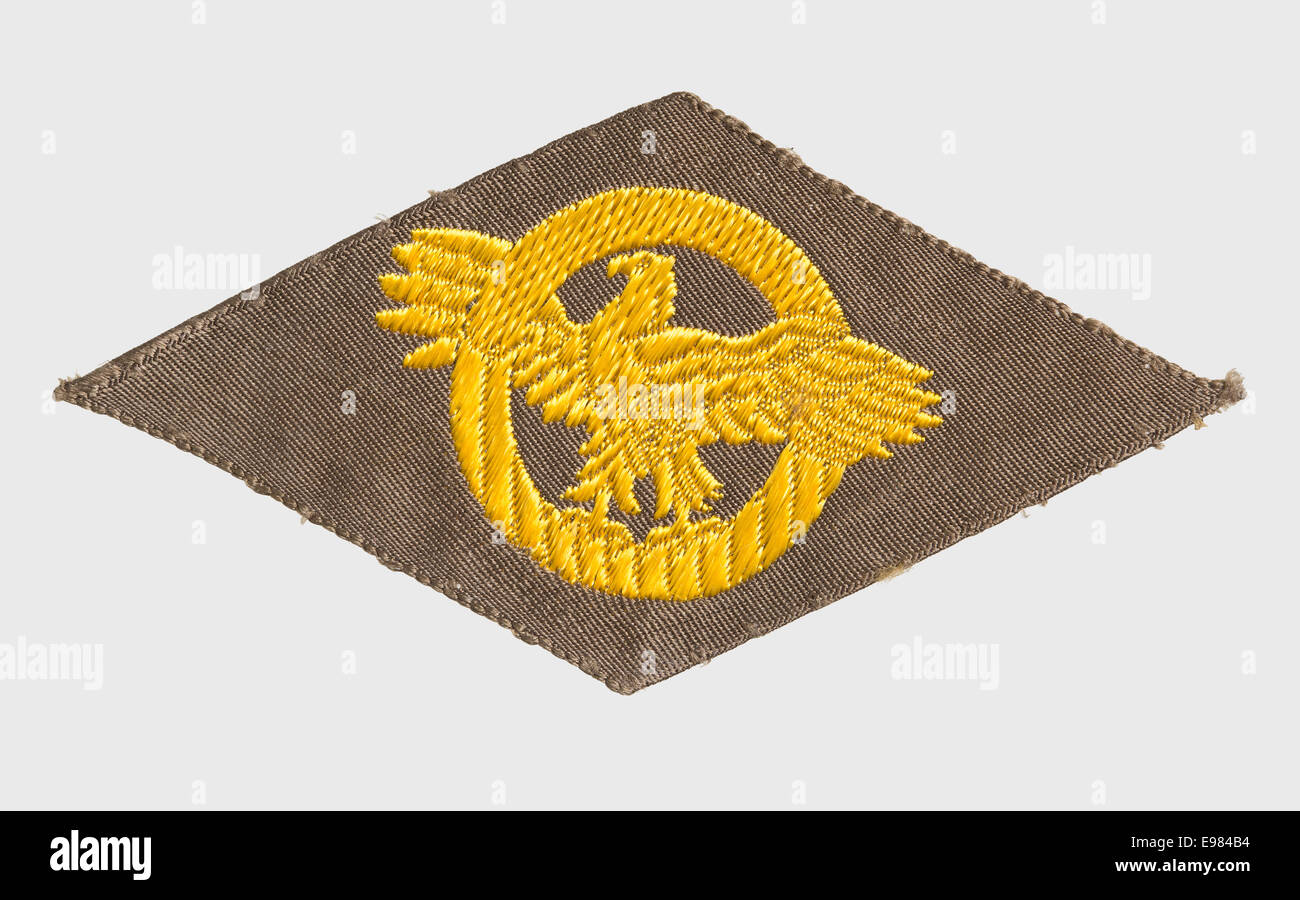1940er Jahre Rauten des zweiten Weltkriegs grün und gold gestickten militärische Abzeichen mit einem Adler und Kreis- Stockfoto