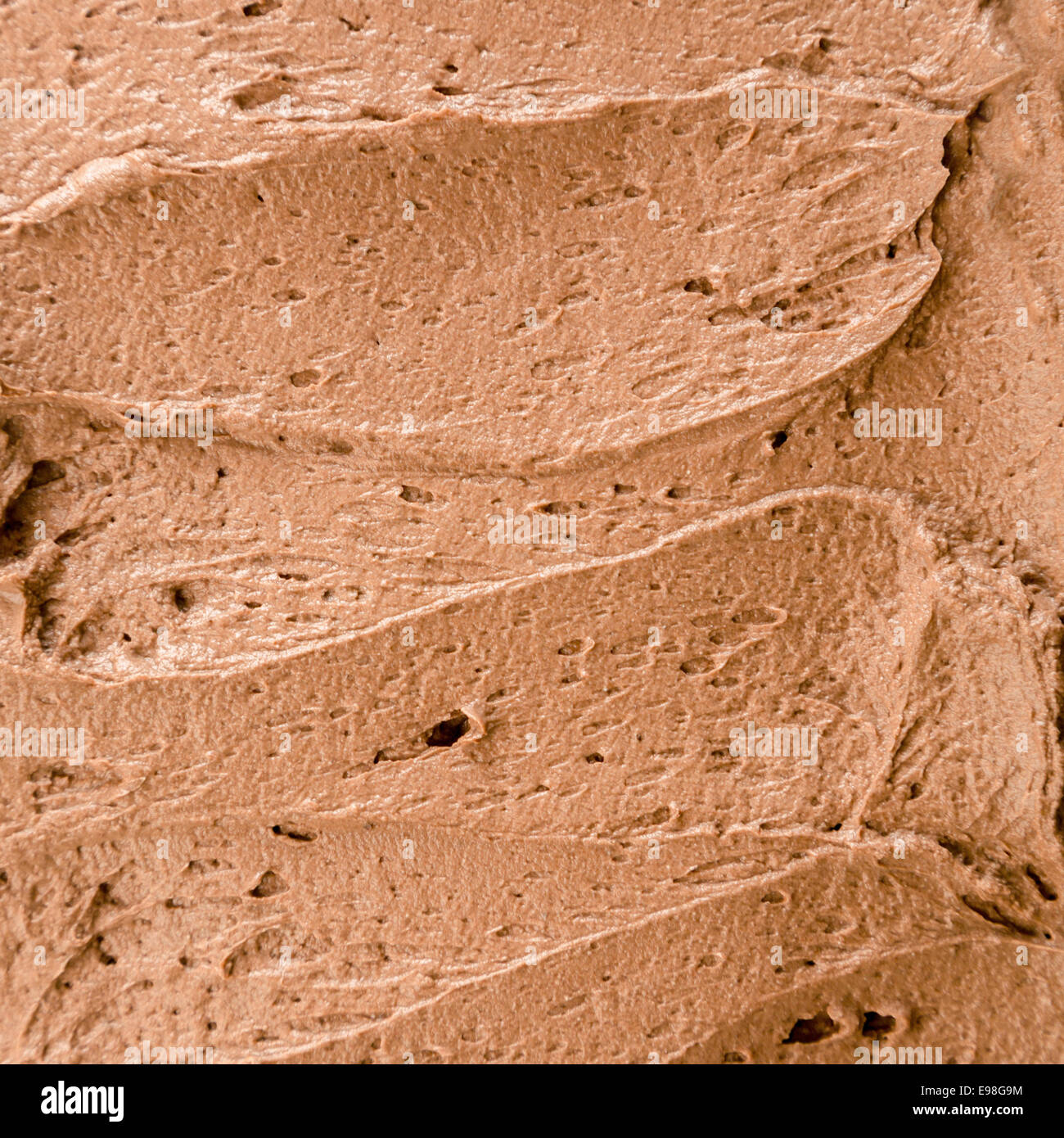 Instant Schokolade Eis Hintergrund mit einer cremigen Textur im quadratischen Format für eine köstliche Sommer-Dessert oder zum mitnehmen in eine Eisdiele Stockfoto Instant Schokolade Eis Hintergrund mit einer cremigen Textur im quadratischen Format für eine köstliche Sommer-Dessert oder zum mitnehmen in eine Eisdiele Stockfoto