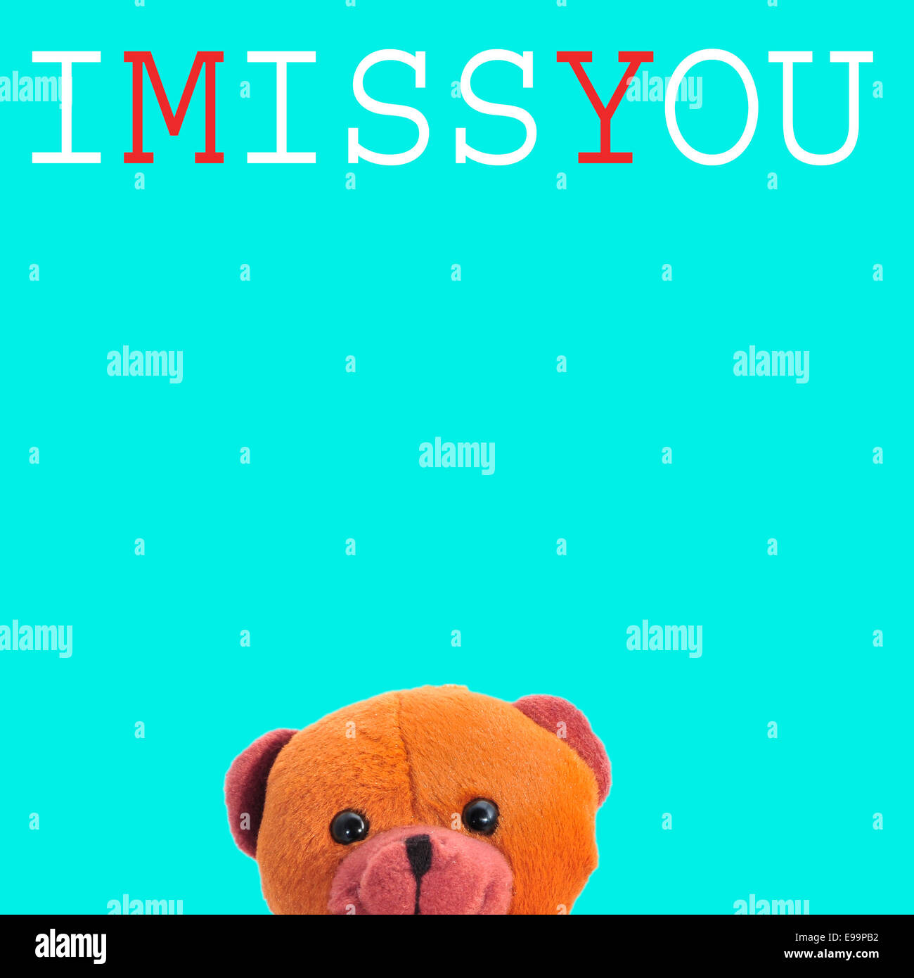 ein Teddybär und dem Text I miss you auf blauem Hintergrund Stockfoto