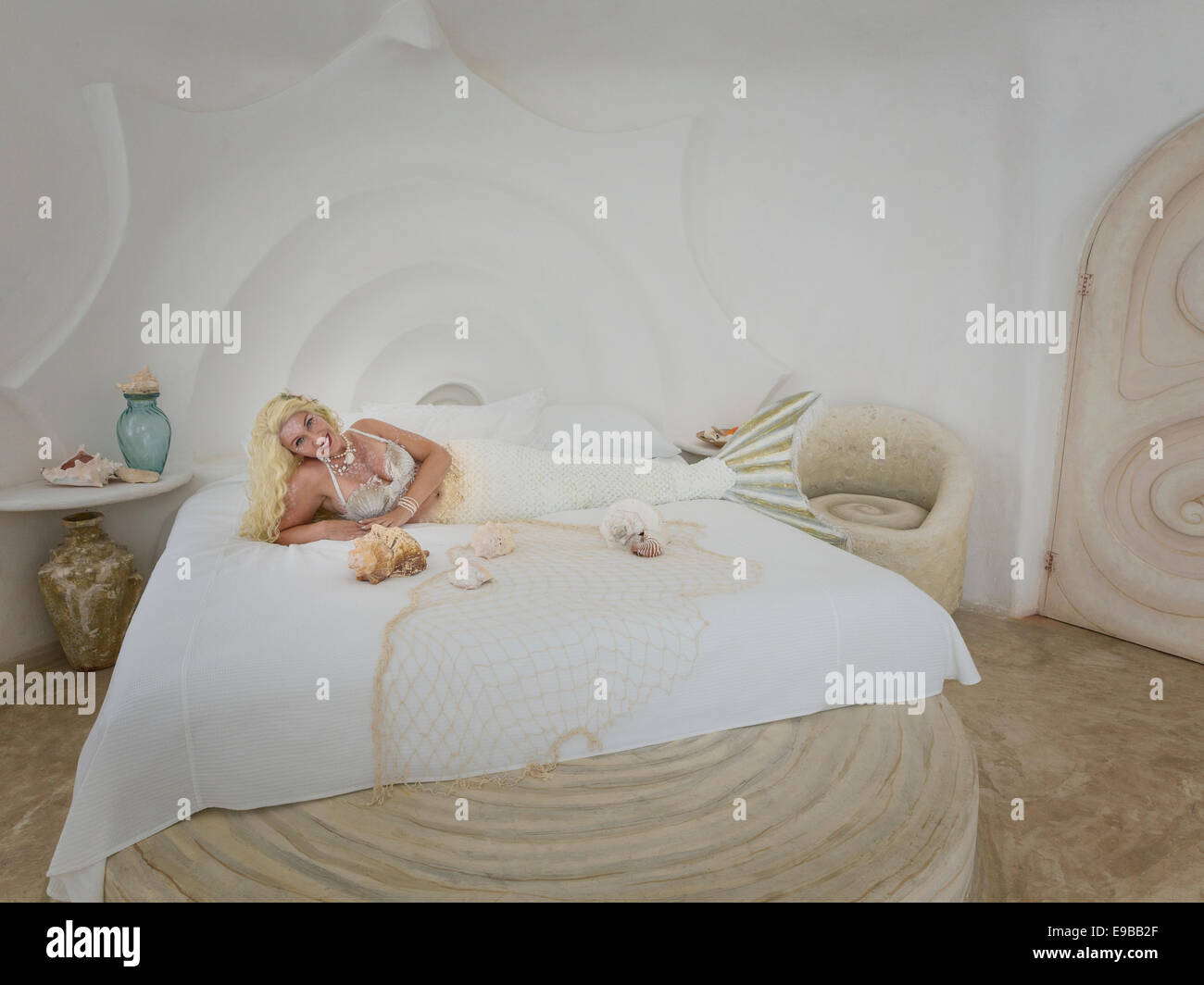 SsMermaid im Bett in der Schale Haus in Isla Mujeres, Mexiko Stockfoto