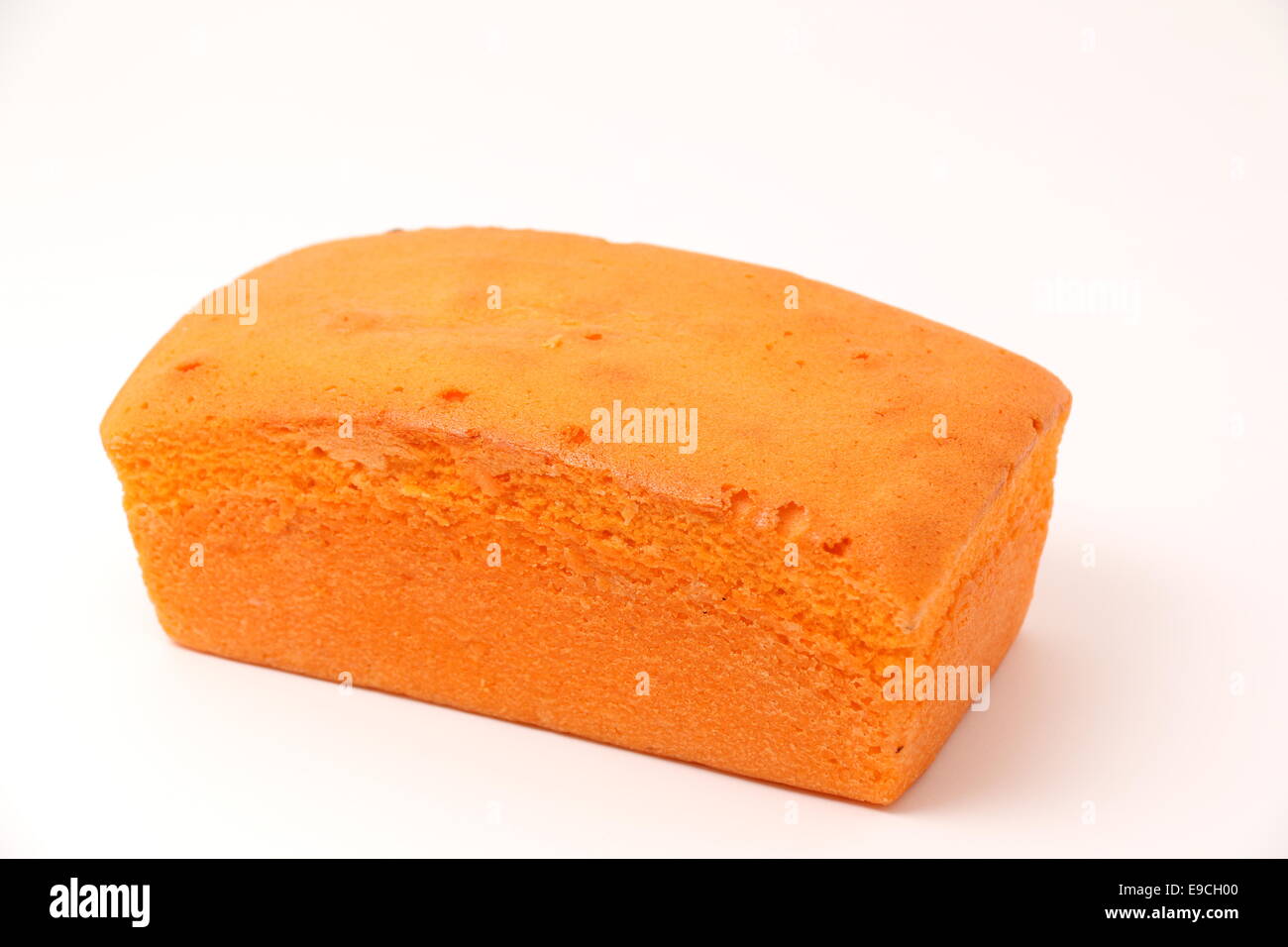 Eine orange Butterkuchen auf weißem Hintergrund Stockfoto