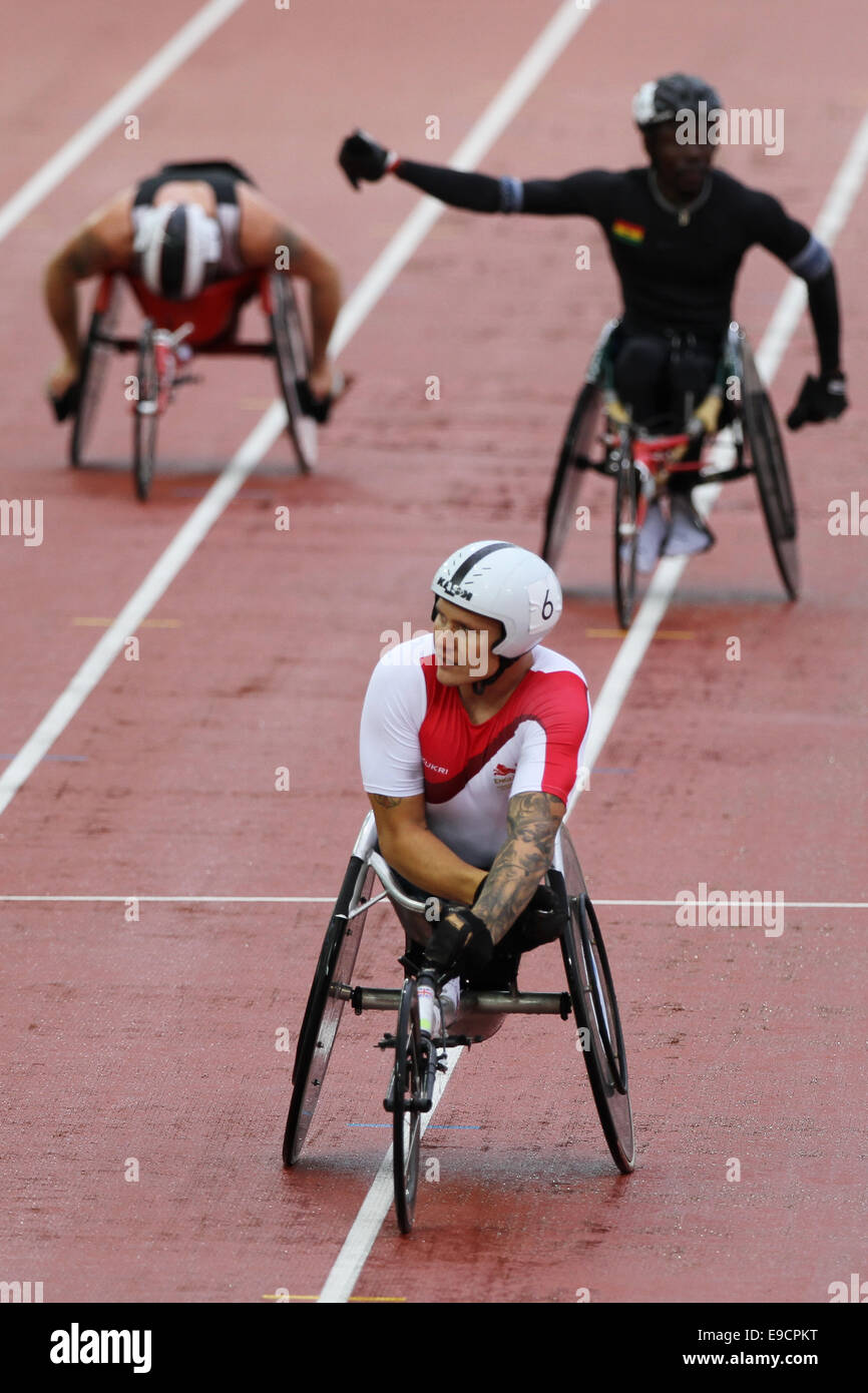 David Weir von England gewinnt das Finale der Herren Para-Sport 1500m T54 Rollstuhl Rennen im Hampden Park, im Jahr 2014 Commonwealth Stockfoto