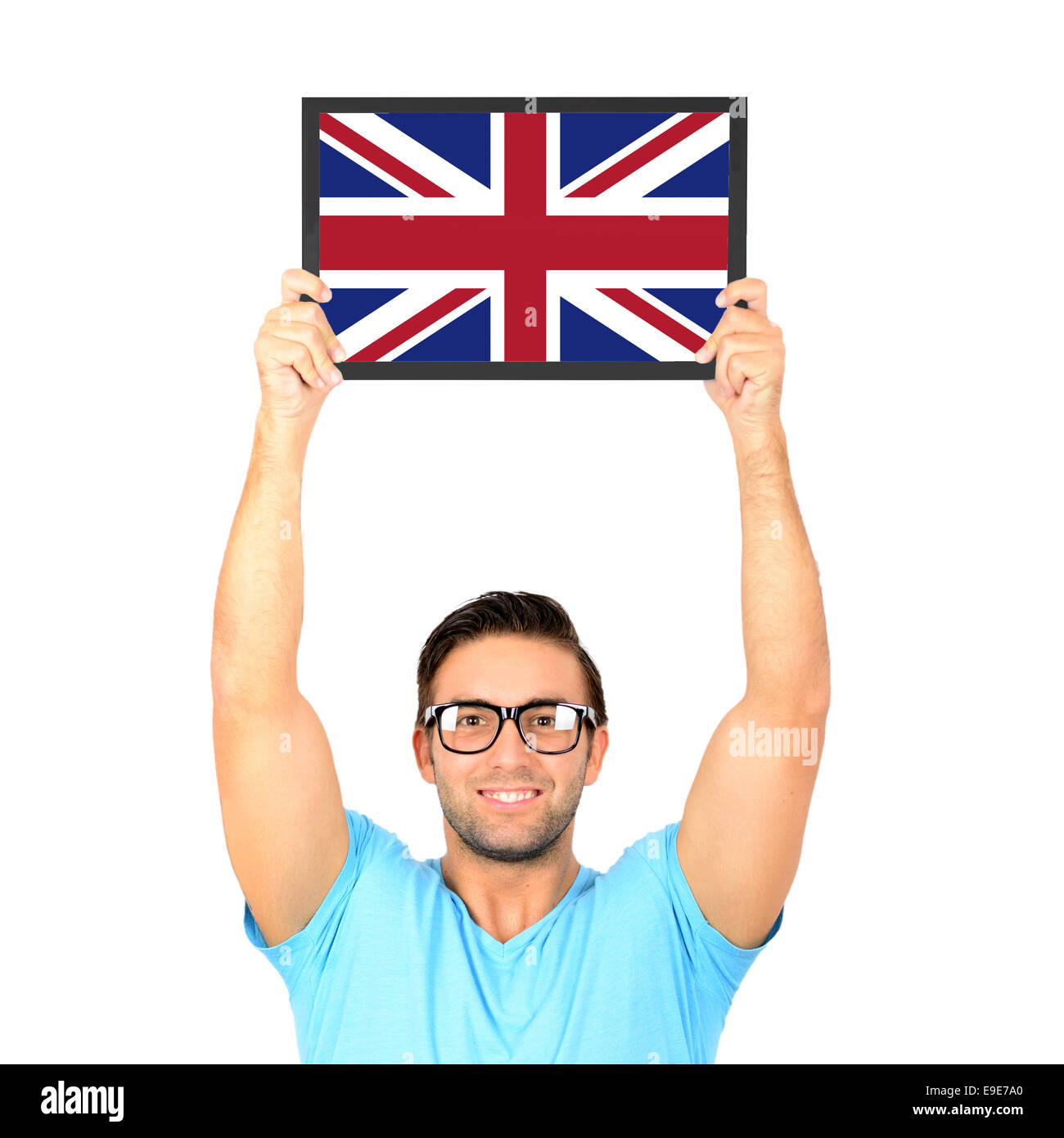 Porträt eines jungen lässig hochhalten Board mit Nationalflagge des Vereinigten Königreichs Stockfoto