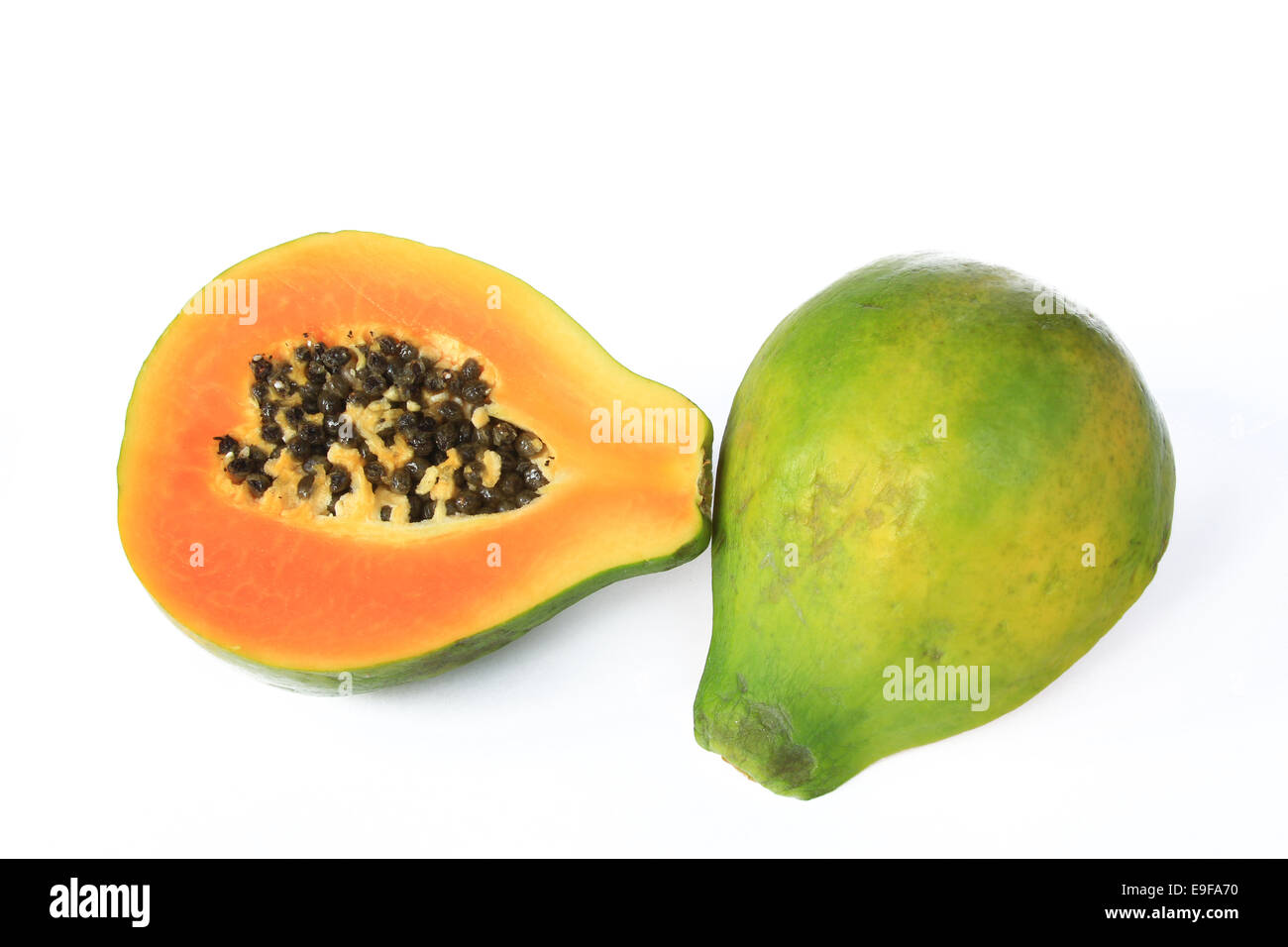 Papaya-Frucht (Carica Papaya) - halbiert Stockfoto