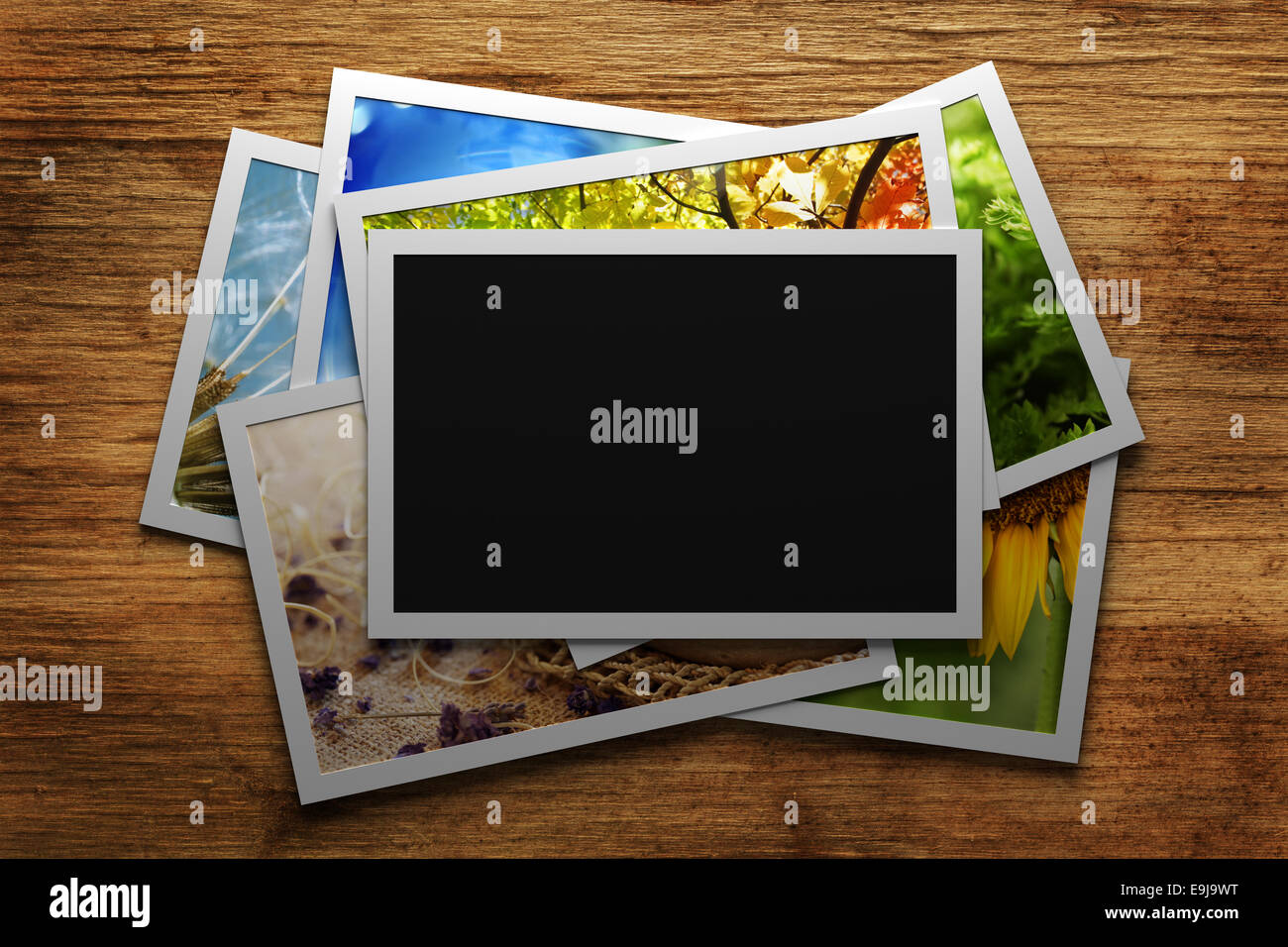 Haufen von bunten Fotos mit leeren frame Stockfoto