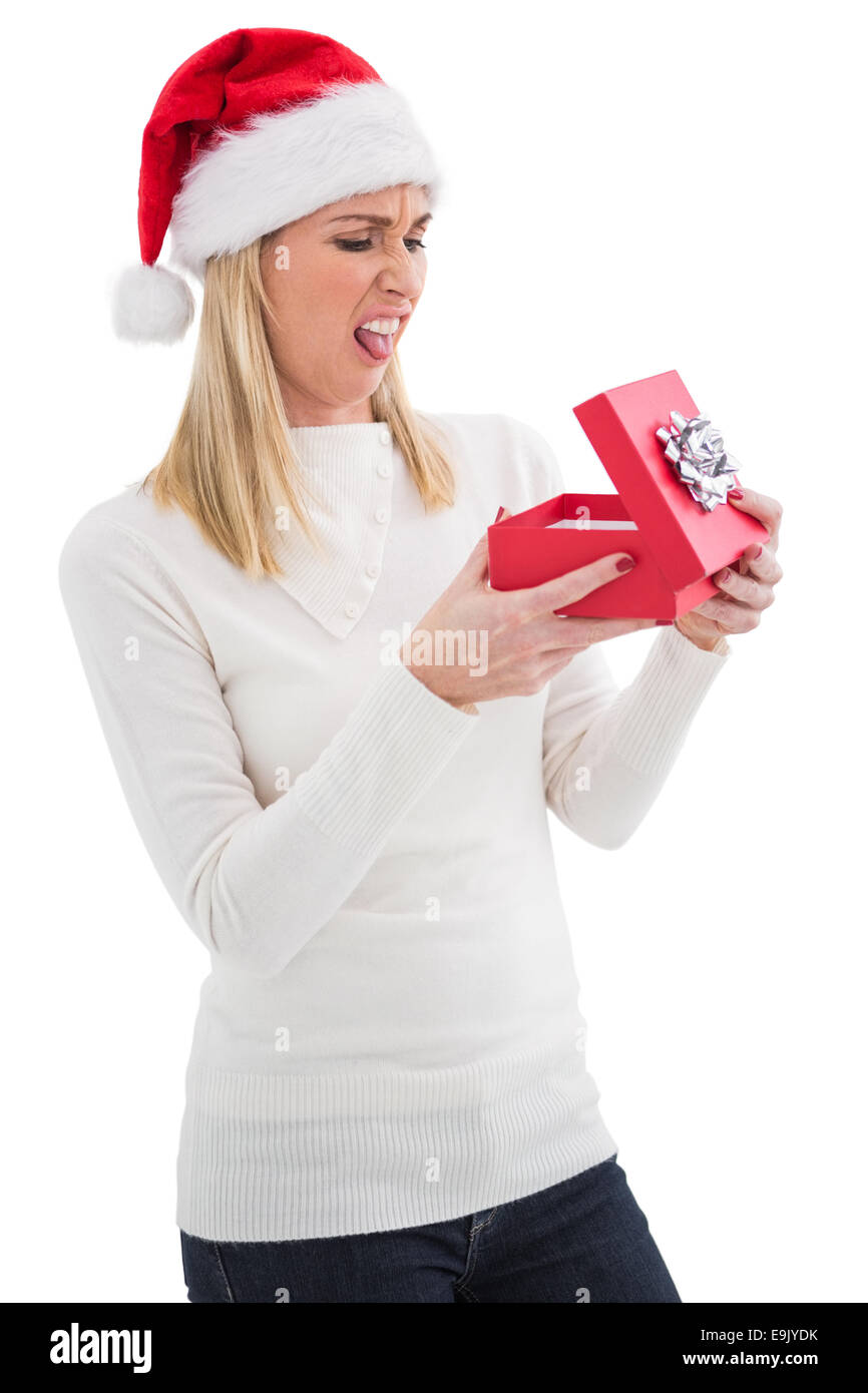 Enttäuscht Blonde Weihnachtsgeschenk öffnen Stockfoto
