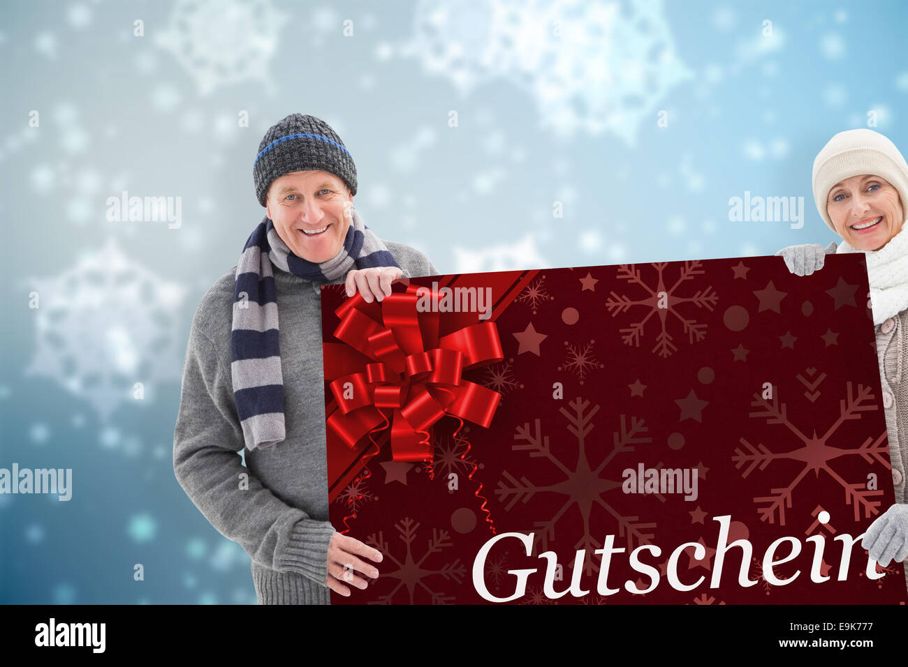 Zusammengesetztes Bild Winter paar zeigt Poster Stockfoto