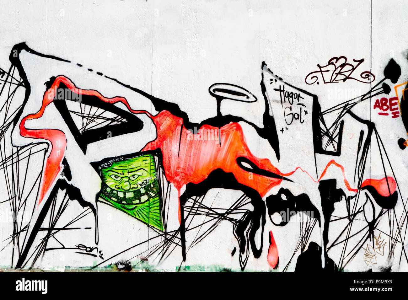 Berlin Wall Graffiti cartoon bunten grünen Gesicht Stockfoto