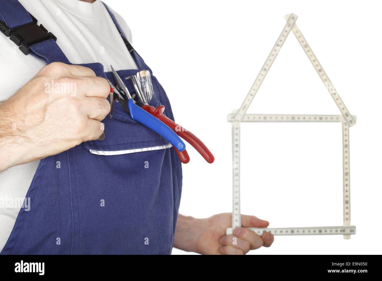 Arbeiter mit symbolischen Haus Stockfoto