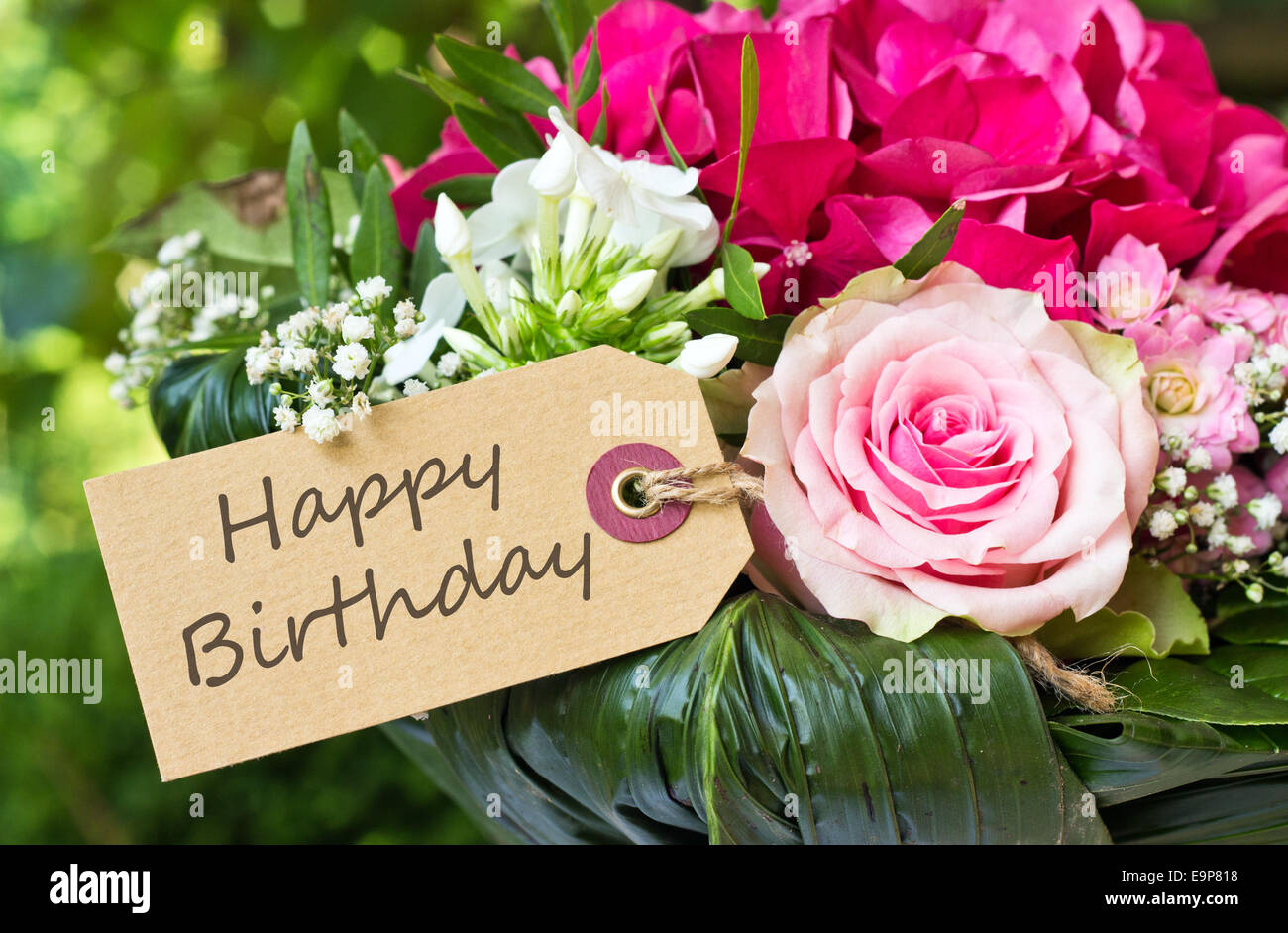 englische Geburtstagskarte mit rosa Blüten Stockfoto