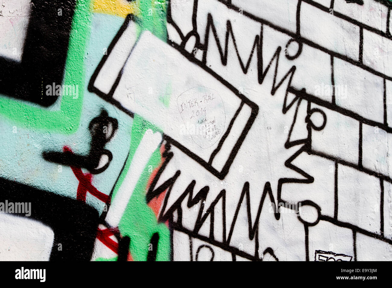 Berlin Wall Graffiti Cartoon Hammer Wand brechen Stockfoto