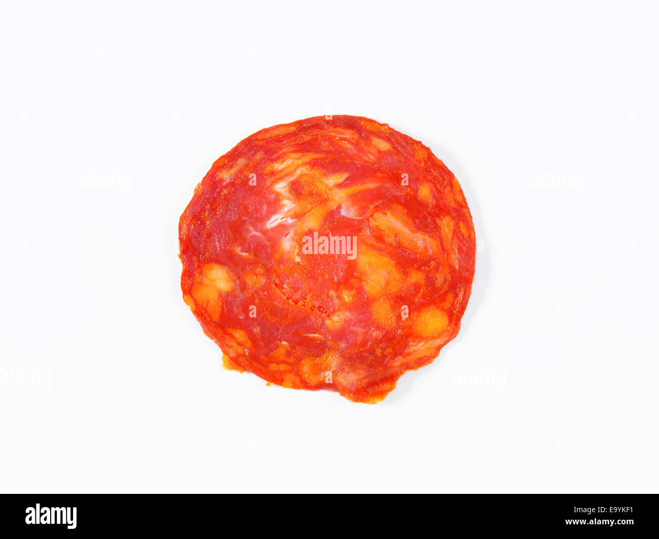Spanische Wurst gewürzt mit geräucherter Pimentón - Scheibe Stockfoto