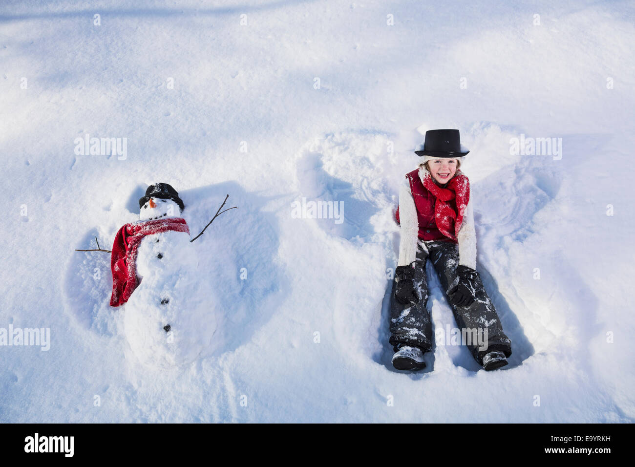 Mädchen, Schneemann, Alaska, Schneeengel, Schnee Stockfoto