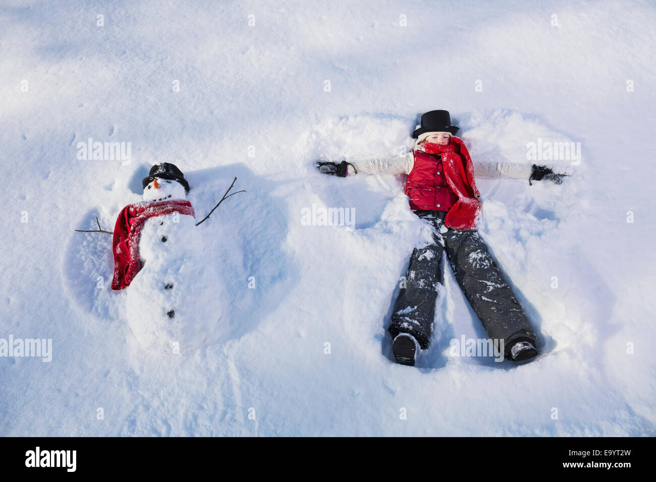 Mädchen, Schneemann, Alaska, Schneeengel, Schnee Stockfoto