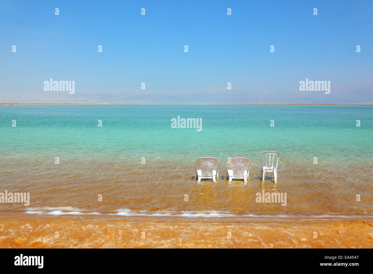 Weißen Strand Sessel und Stuhl Stockfoto