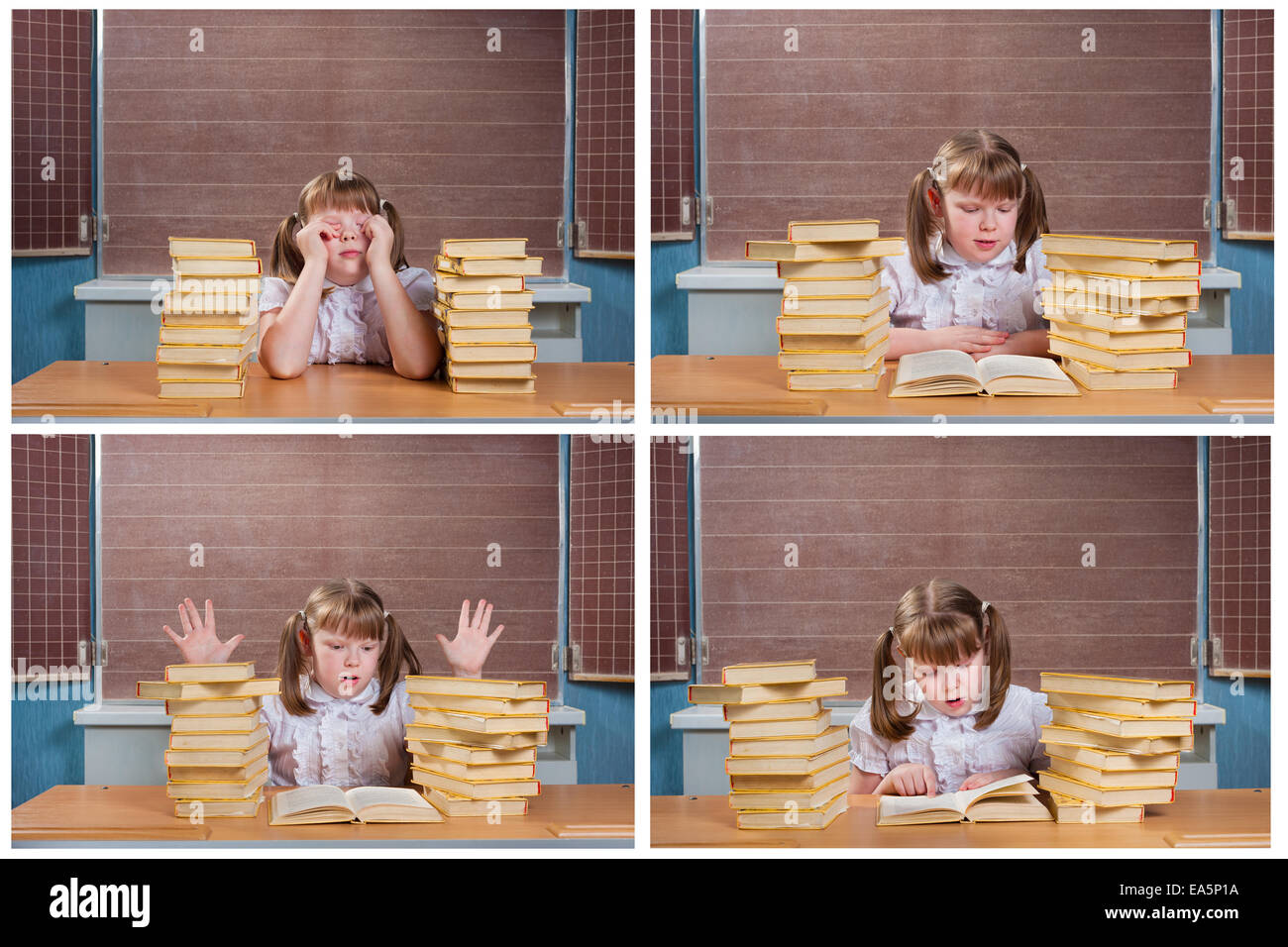 niedliche Schulmädchen an einem Schreibtisch mit Büchern Stockfoto