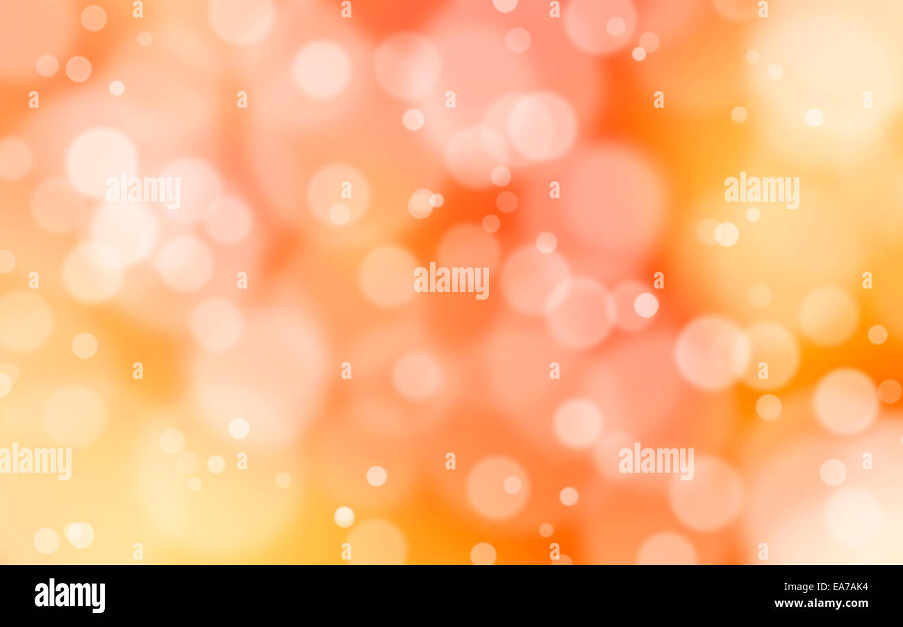 Eine gelbe und rote Bokeh-Hintergrund mit weißen Fackeln Stockfoto