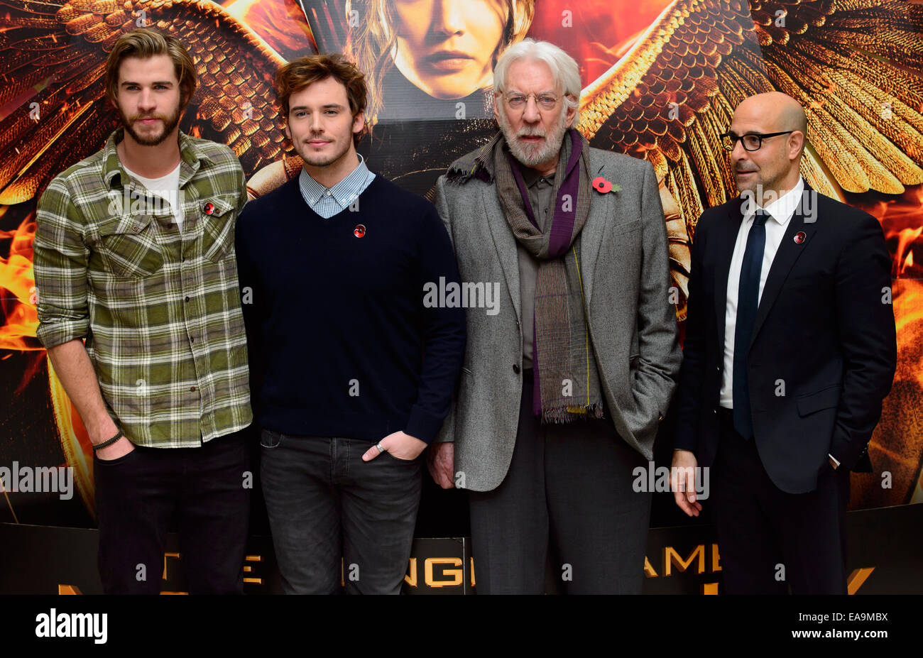Liam Hemsworth, Josh Hutcherson, Donald Sutherland, Stanley Tucci bei einem Foto rufen Sie für The Hunger Games Mockingjay Teil 1. Stockfoto