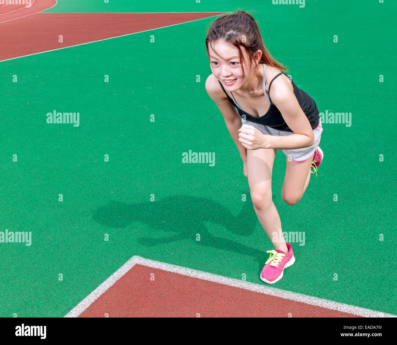 Chinesische Sportlerin zu Rennen starten Stockfoto