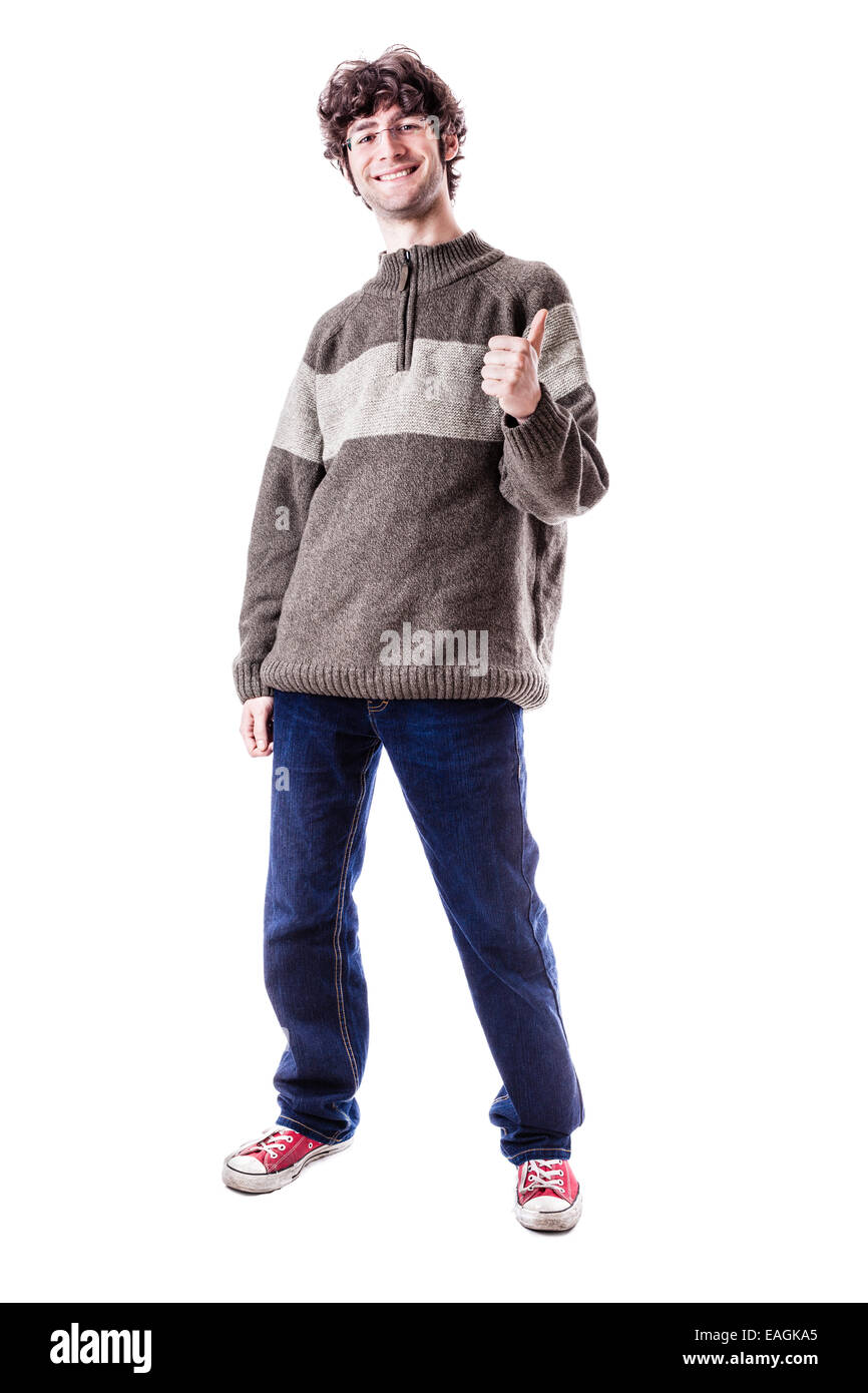 ein schöner Kerl, vielleicht ein Student in Freizeitkleidung mit Daumen nach oben. isoliert auf weiß Stockfoto