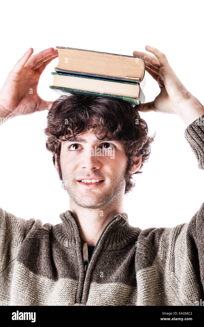 eine hübsche Studentin mit einige Bücher über einen weißen Hintergrund isoliert Stockfoto