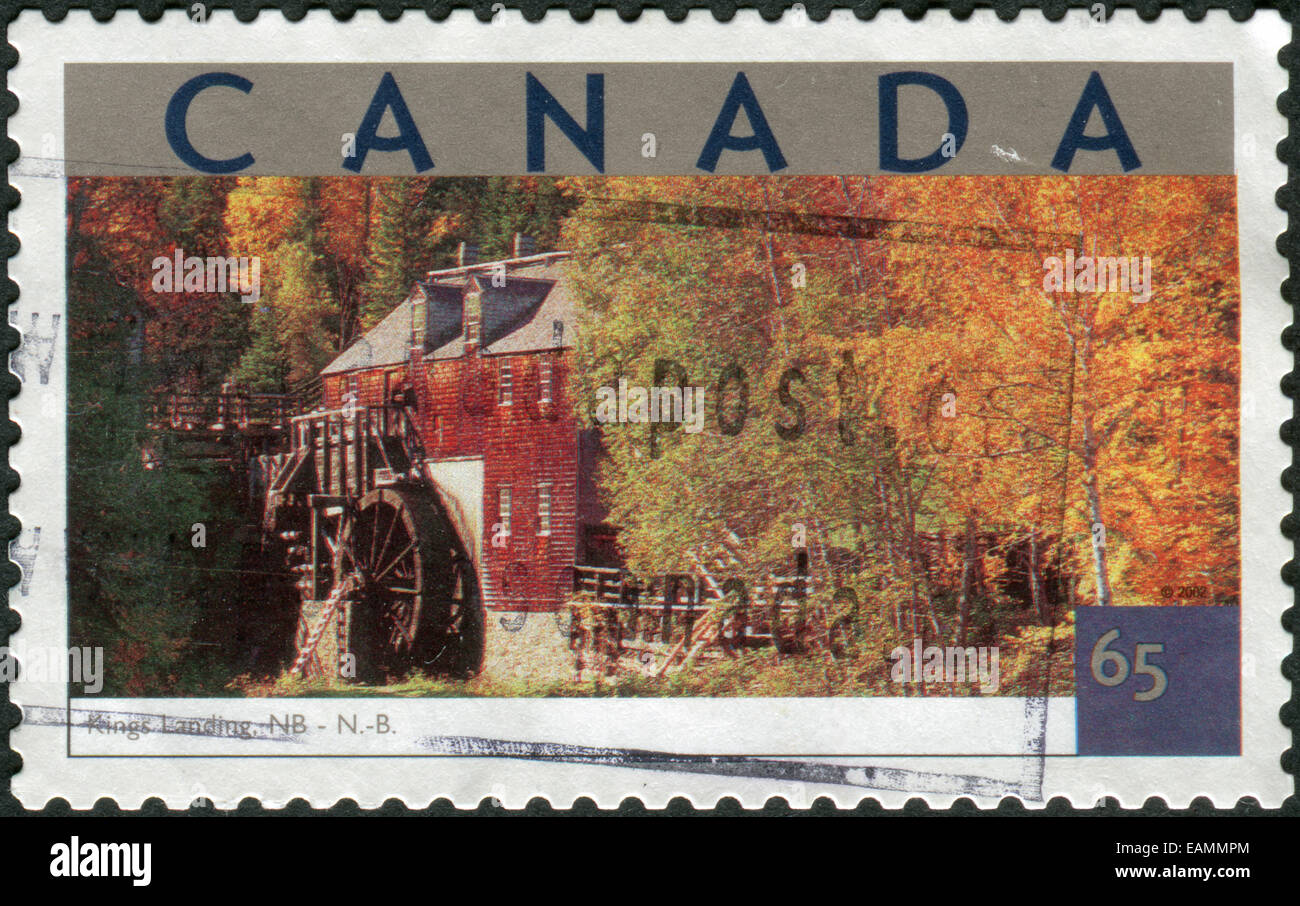 Kanada - ca. 2002: Briefmarke gedruckt in Kanada zeigt Sehenswürdigkeiten - Kings Landing, New Brunswick, ca. 2002 Stockfoto