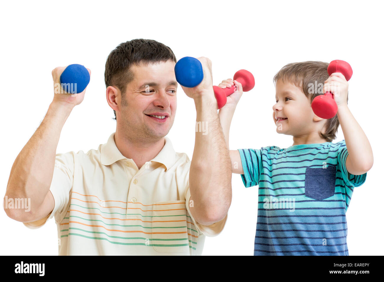 Papa und Kind Sohn Übung mit Hanteln zusammen Stockfoto