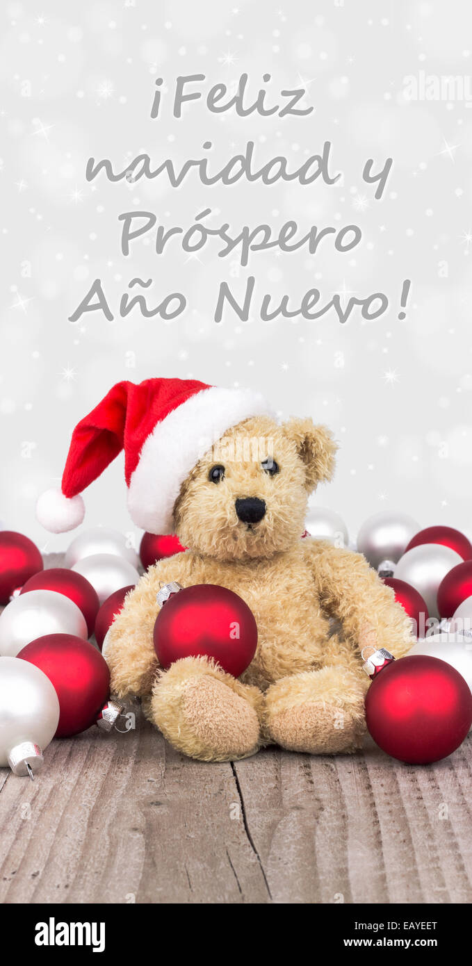 spanische Weihnachtskarte mit Teddybär Stockfoto