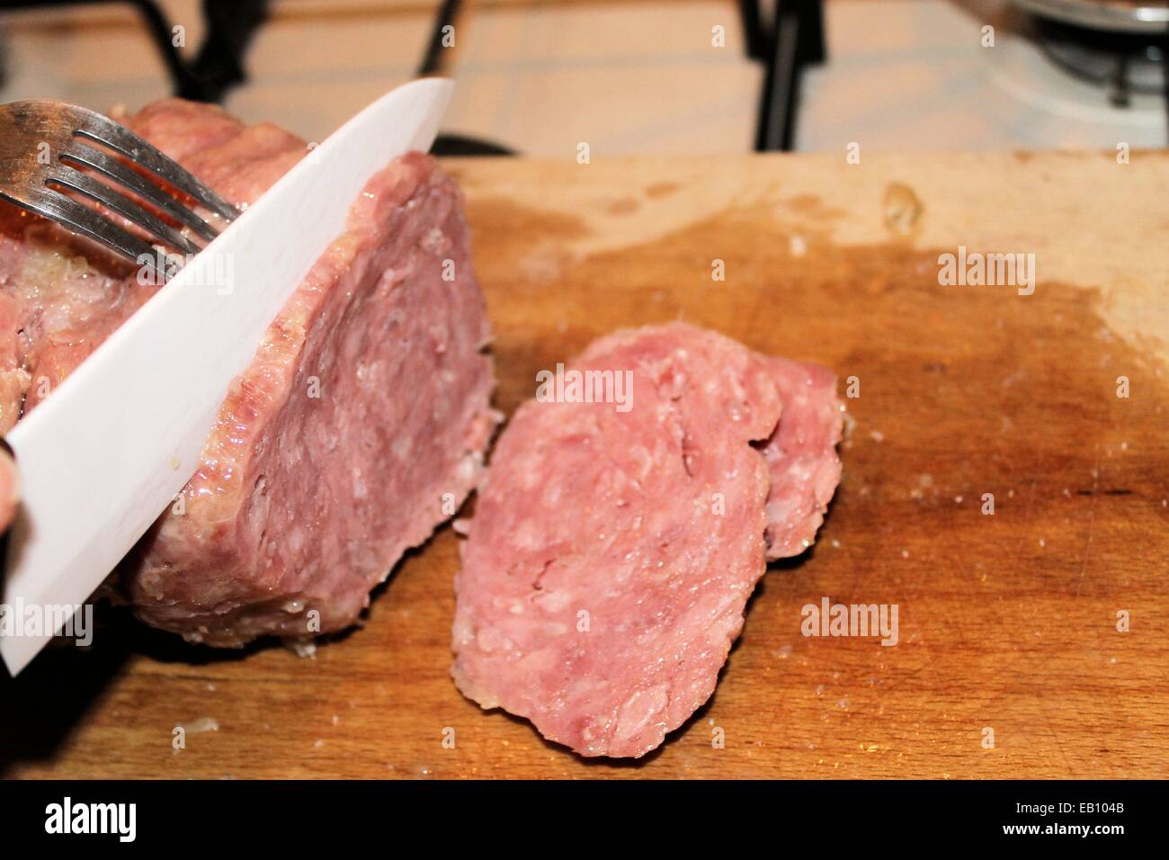 Schneiden salami Stockfoto