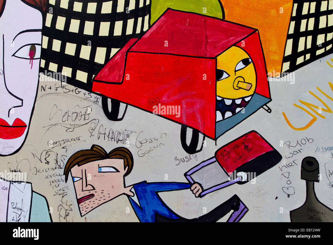 Graffiti-Cartoon Stichwörter Straßenkunst Berliner Mauer Stockfoto