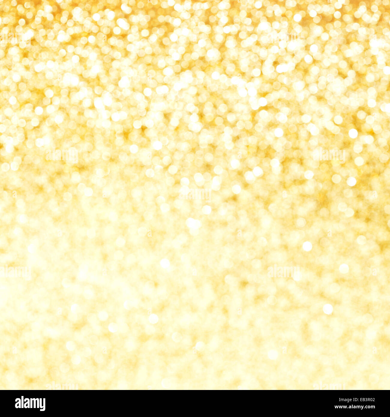 Goldene festliche Glitzer Hintergrund mit defokussierten Lichter Stockfoto