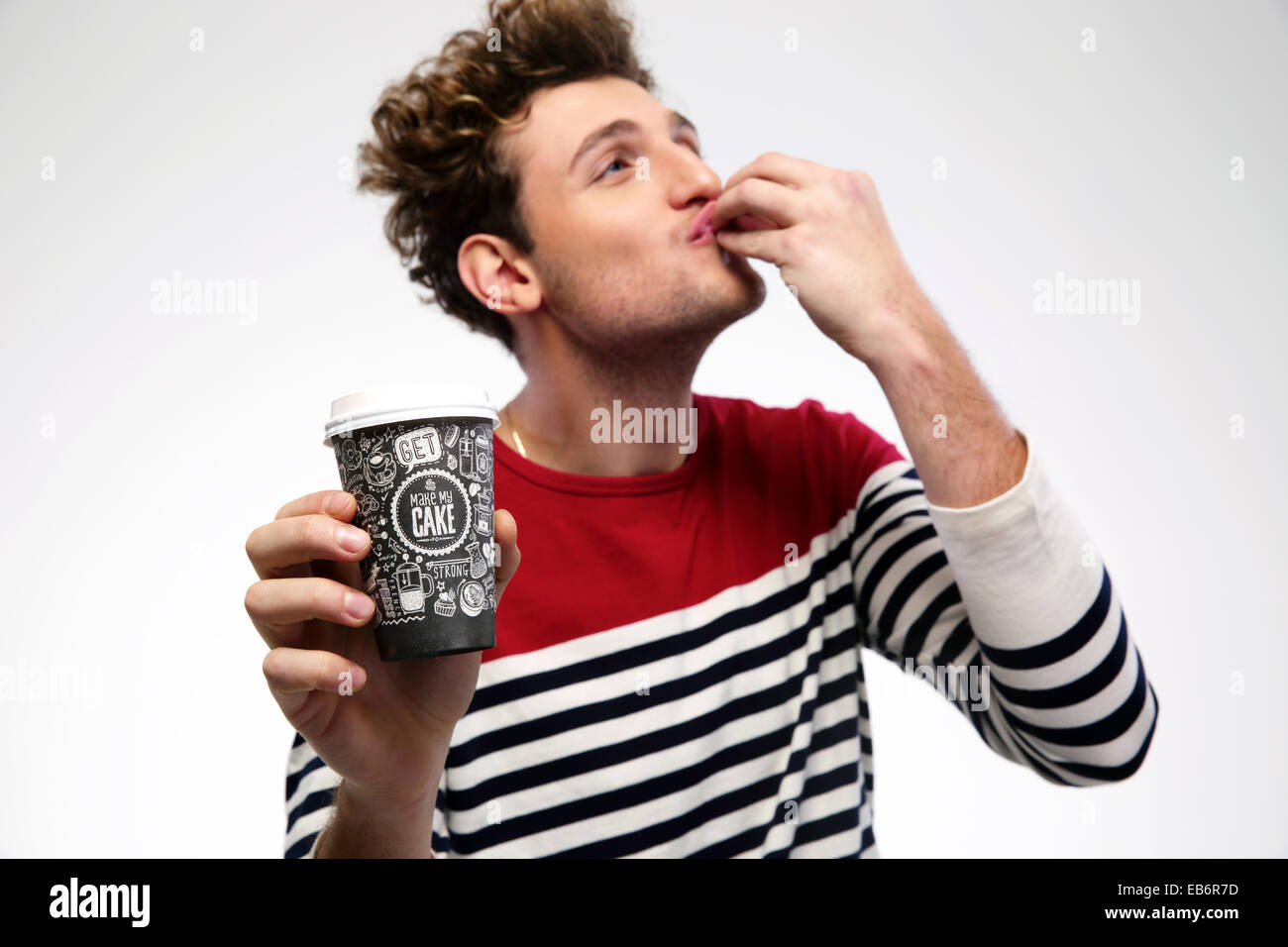 Porträt von einem lustigen Mann mit Kaffee Stockfoto
