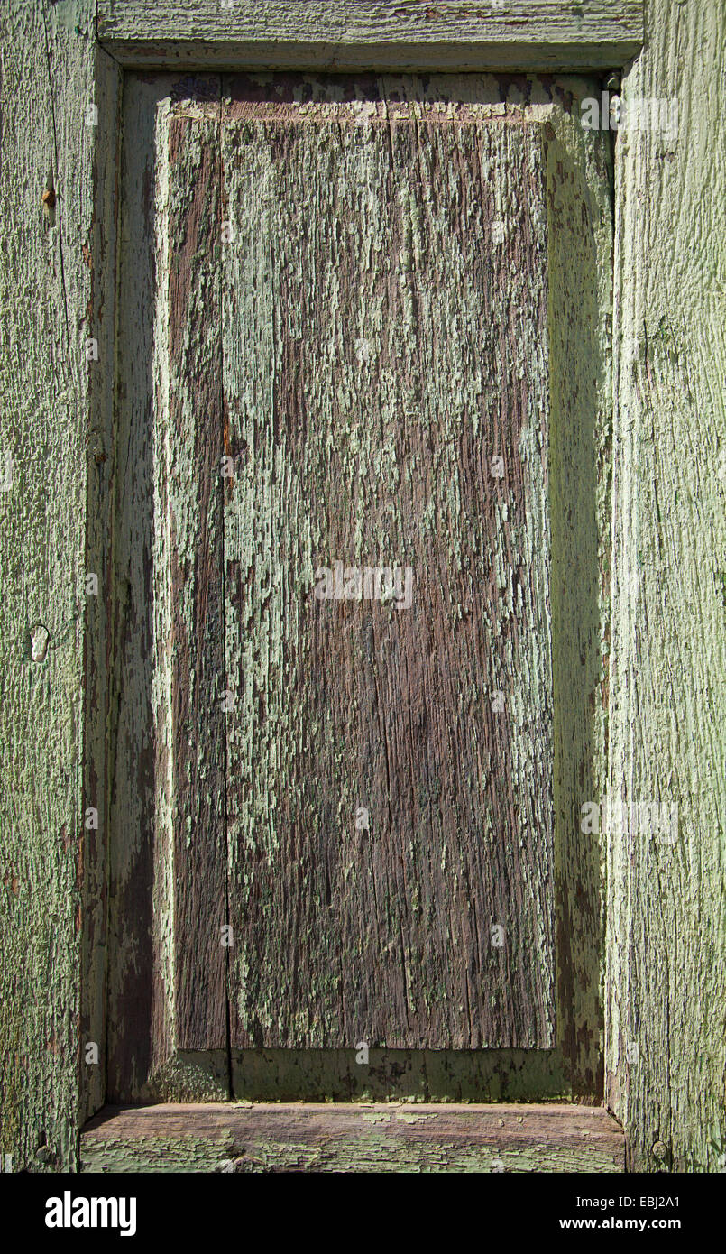 alten abblätternde Farbe auf Holzplatte Stockfoto