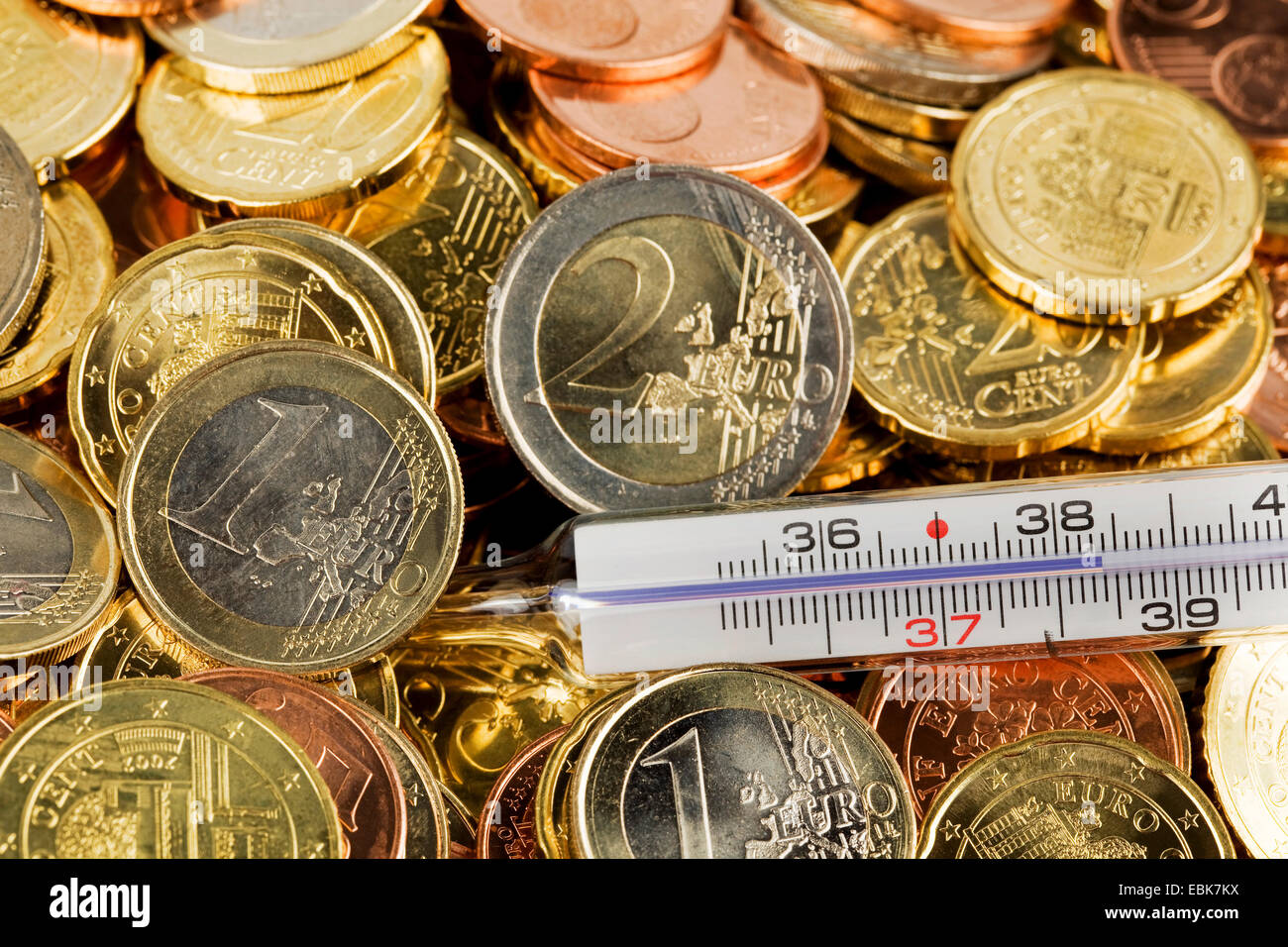 Euro-Münzen und thermometer Stockfoto