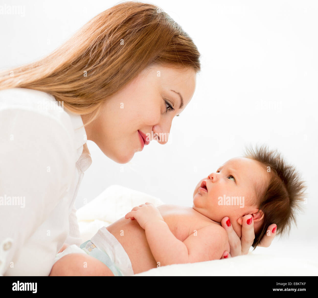 Glückliche Mutter mit ihrem Neugeborenen baby Stockfoto