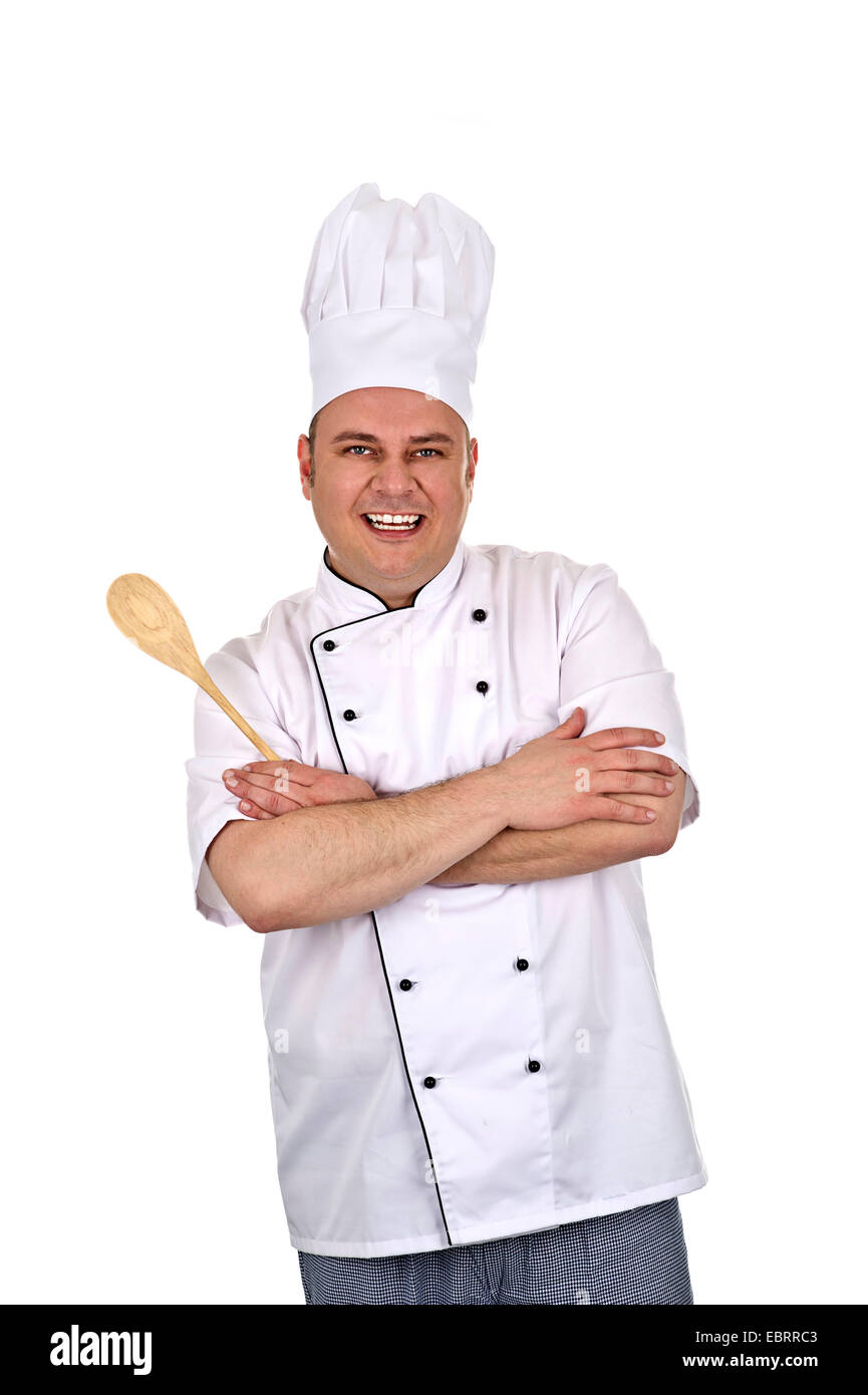 Kochen Sie mit verschränkten Armen und Holzlöffel Stockfoto