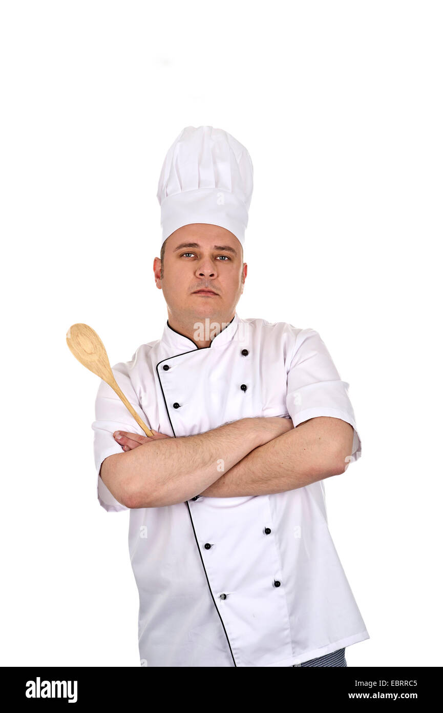 Kochen Sie mit verschränkten Armen und Holzlöffel Stockfoto
