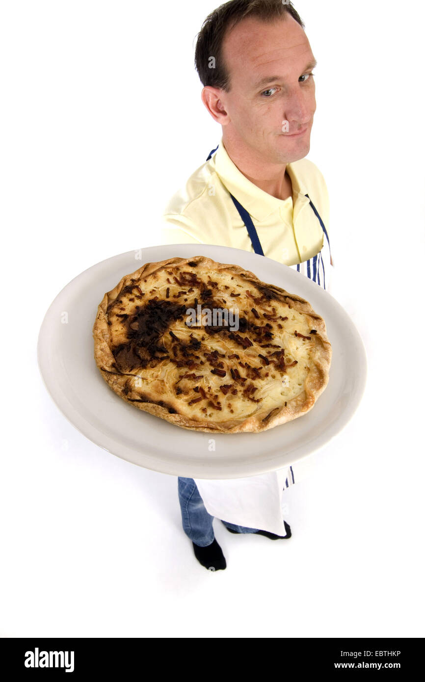 Mann mit Flammkuchen Flamb e Stockfoto