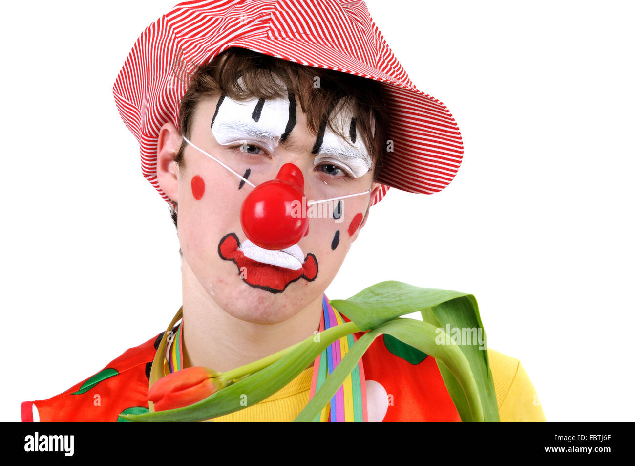 traurige Clown mit hängenden Tulpe Stockfoto