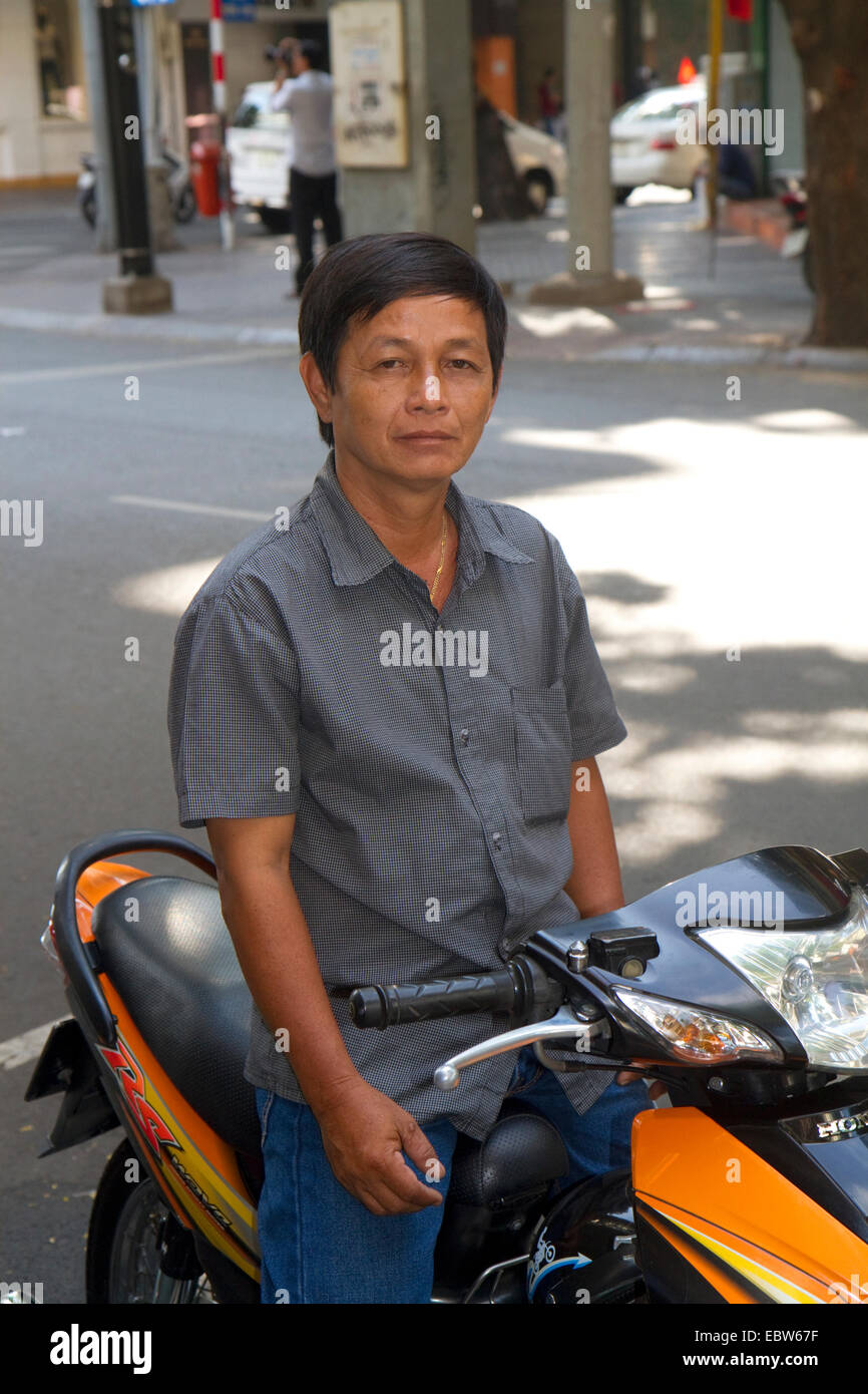 Mototaxi Fahrer in Ho-Chi-Minh-Stadt, Vietnam. Stockfoto