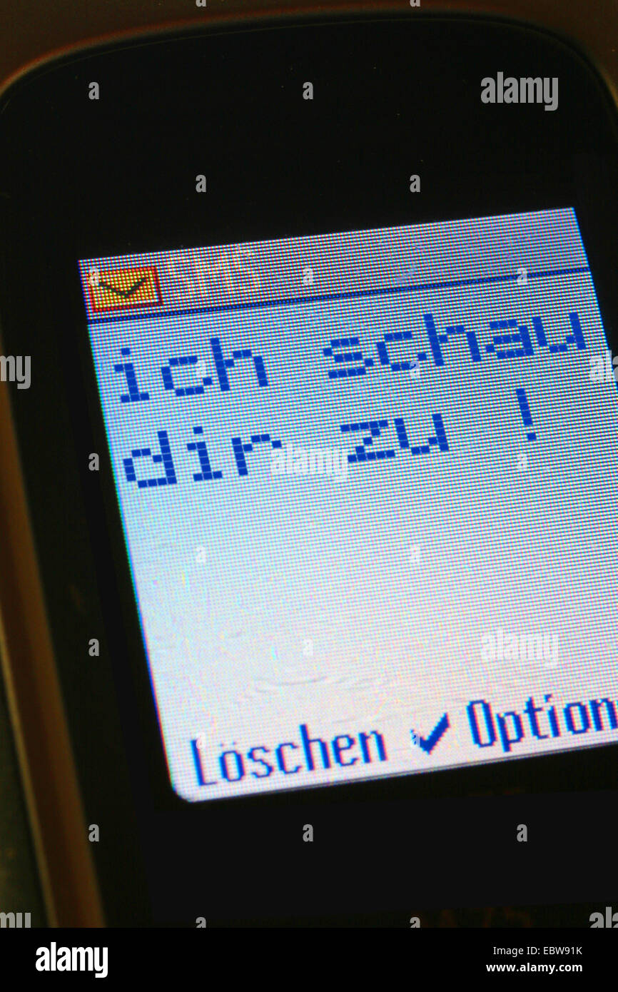 SMS ich beobachte dich Stockfoto