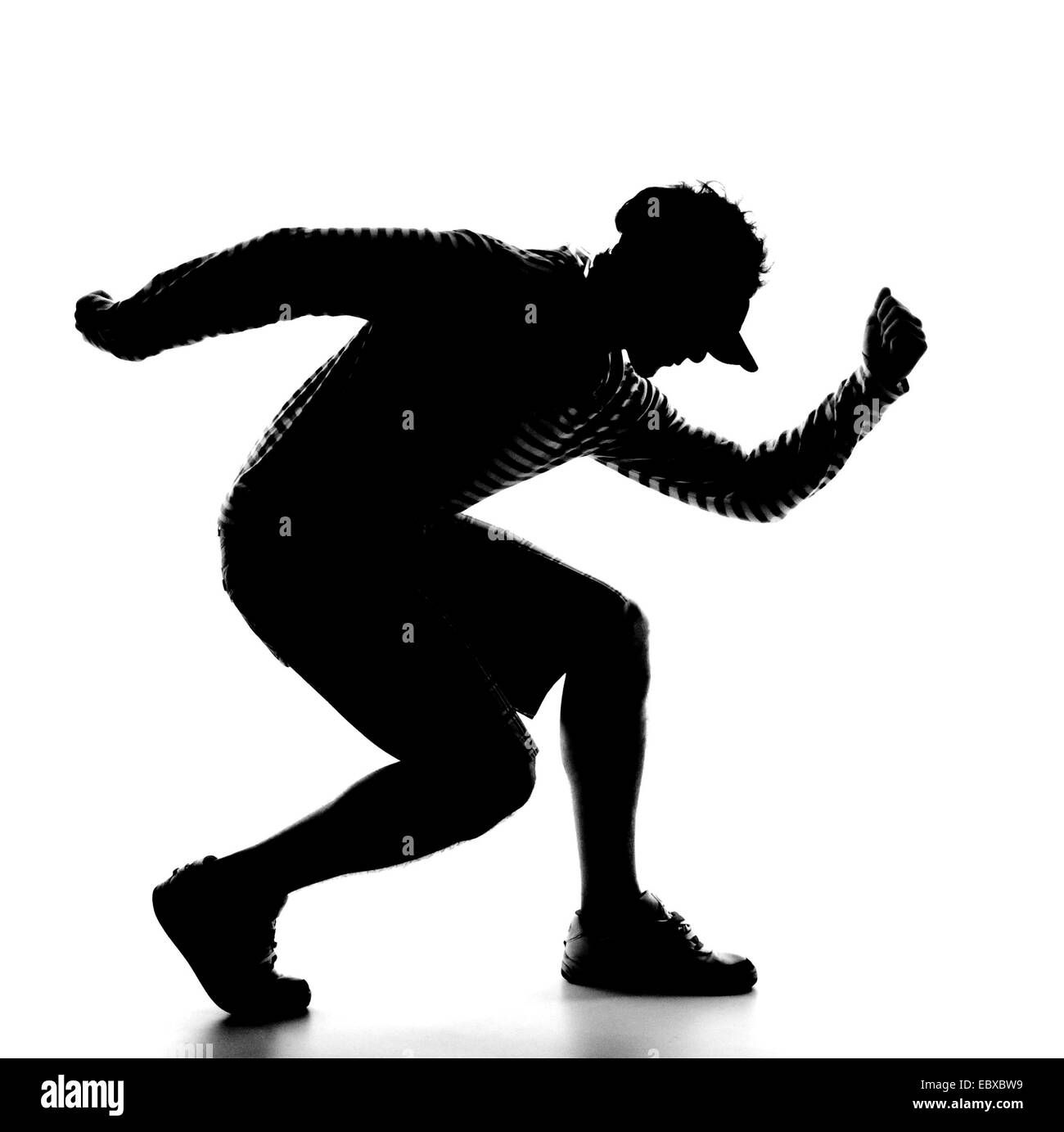 Silhouette von einem männlichen Tänzer Stockfoto