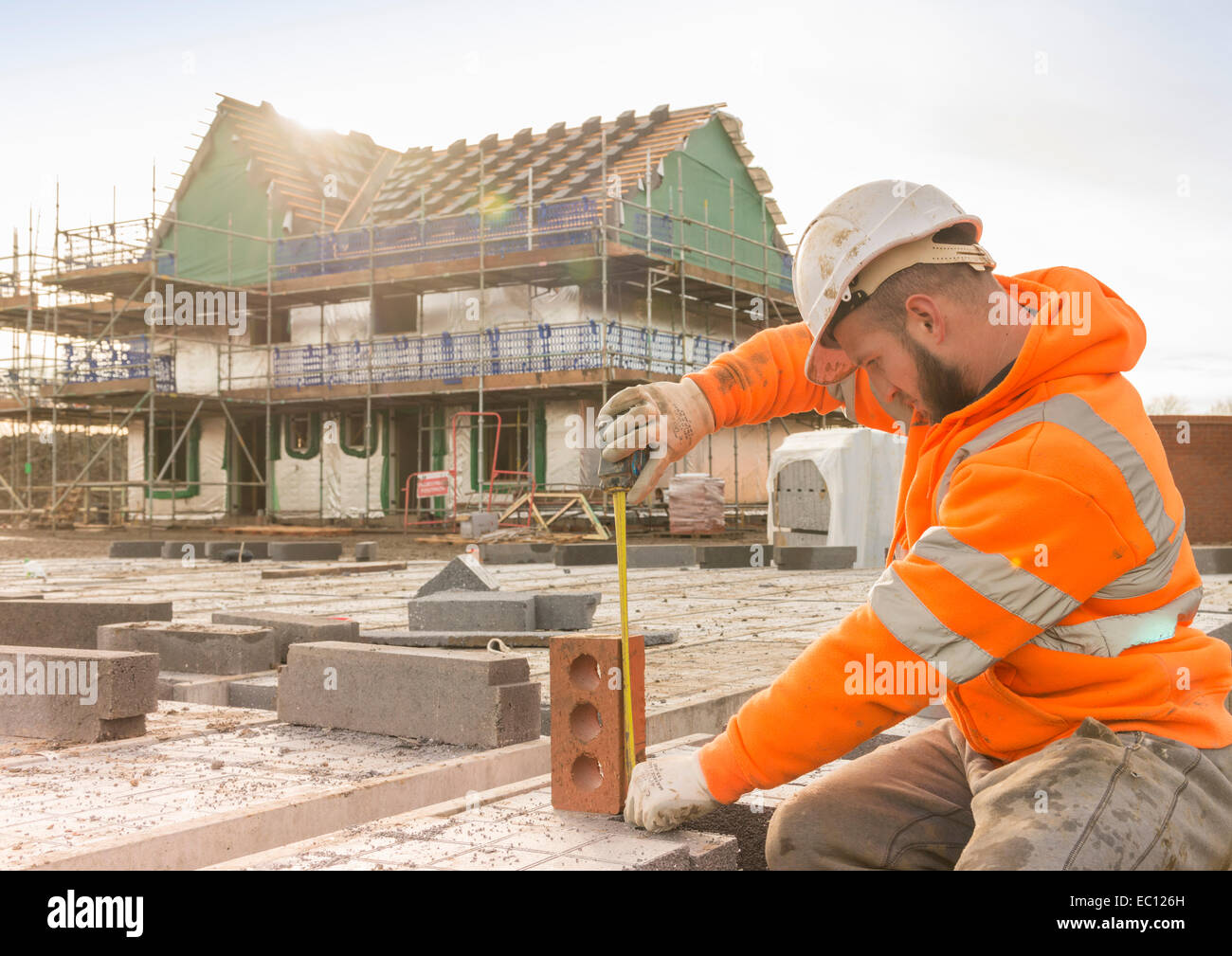 Ein Baumeister arbeiten auf einer Baustelle Stockfoto