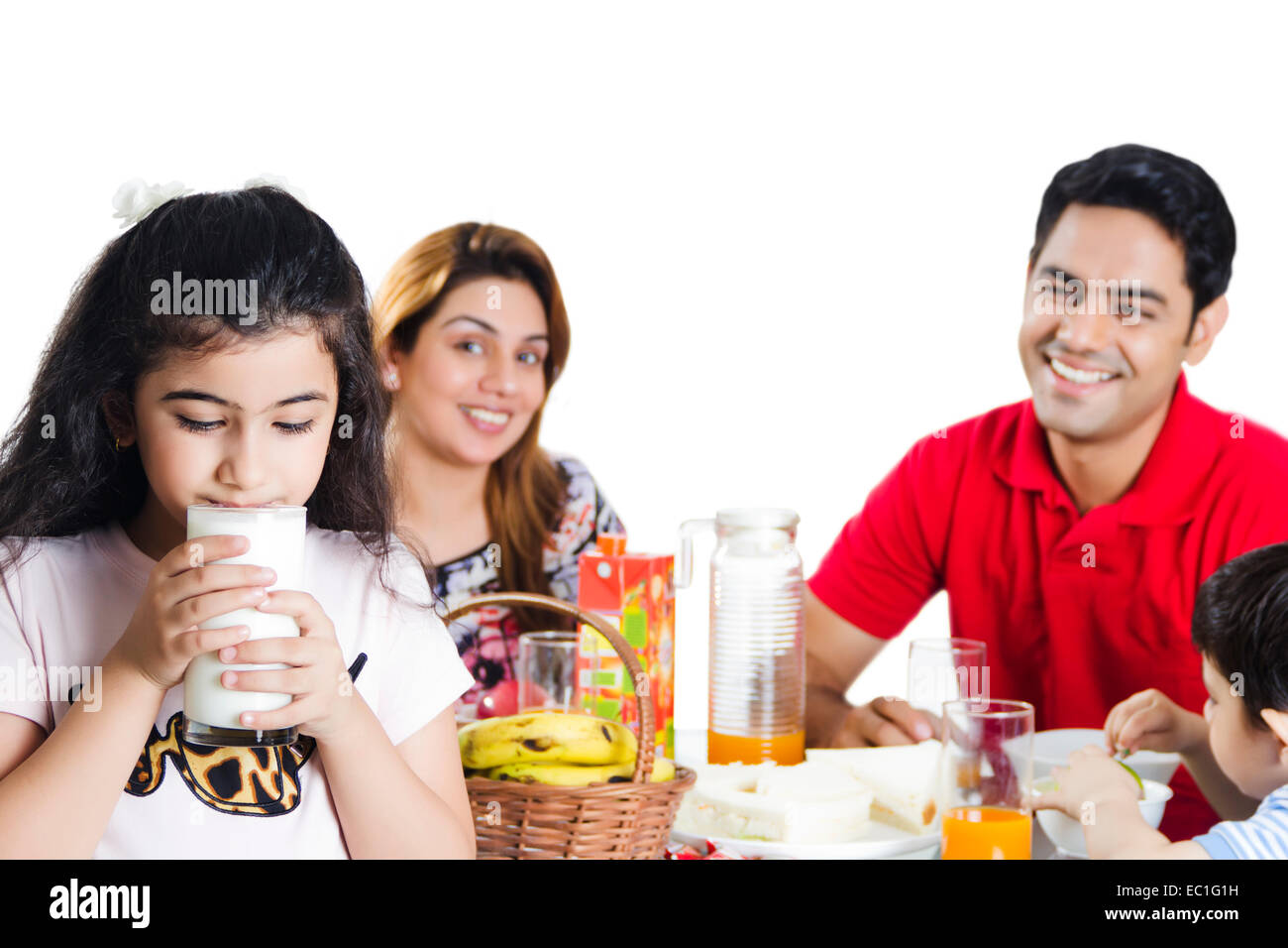 indischer Eltern mit Kind Frühstück Stockfoto
