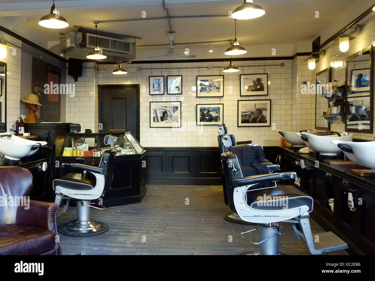 Huckle modische Herren Friseure in Hoxton, London Stockfoto