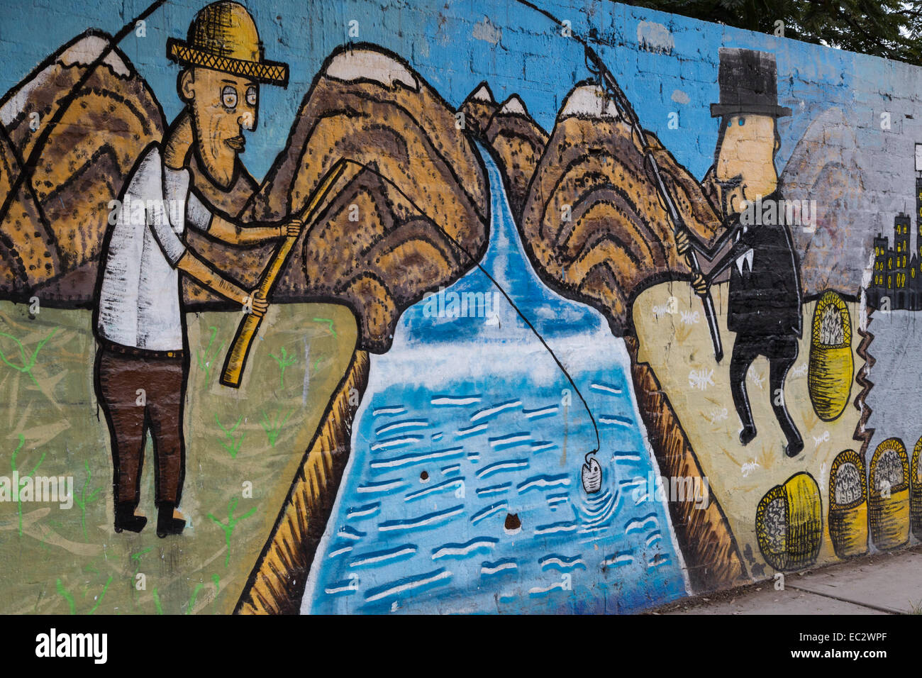Urbane Kunst zeigt zwei Männer angeln.  Einer der Haken des anderen in der spanischen kolonialen Stadt Santiago de Querétaro zu stehlen. Stockfoto