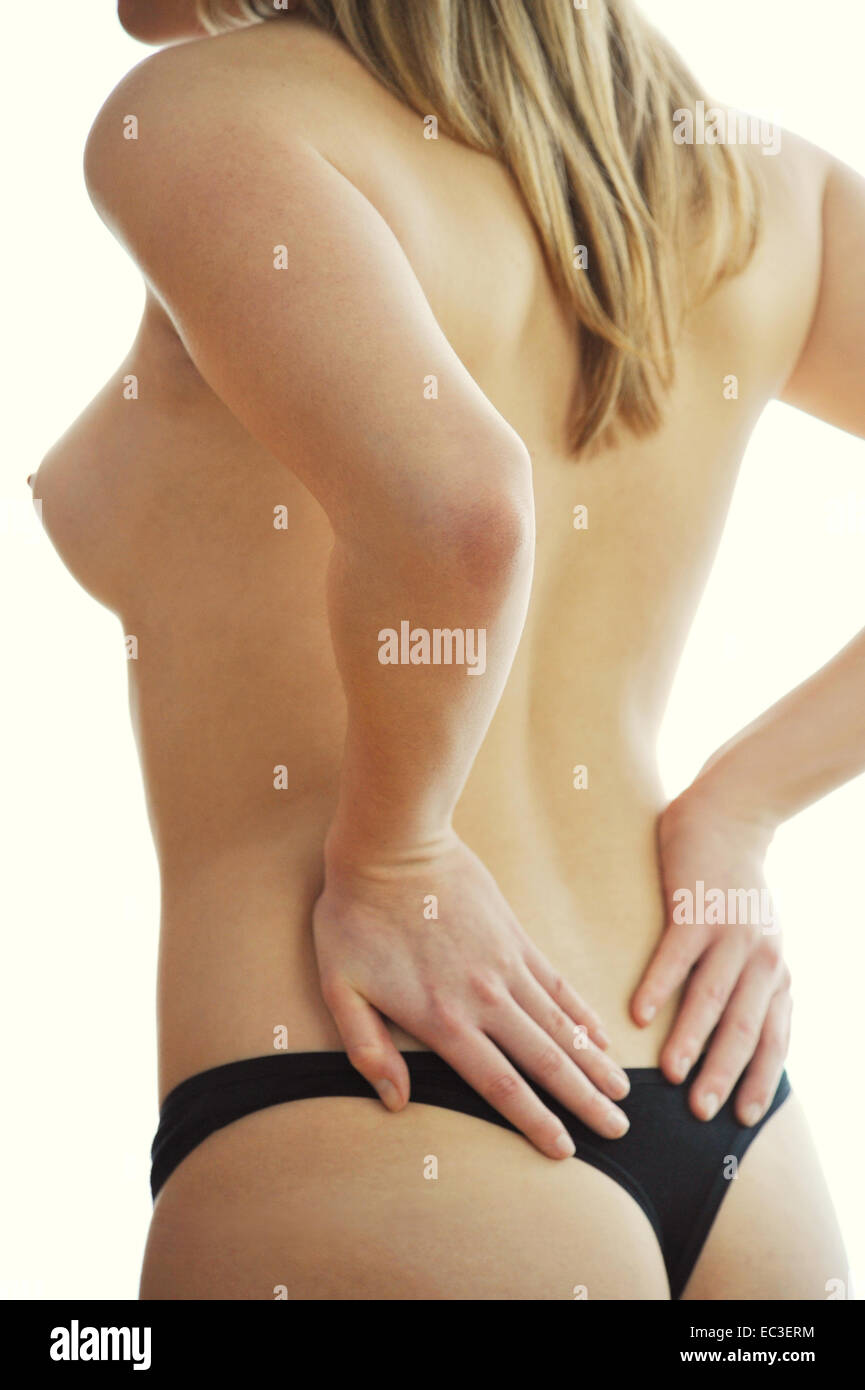 Junge Frau, String-tanga Stockfotografie - Alamy