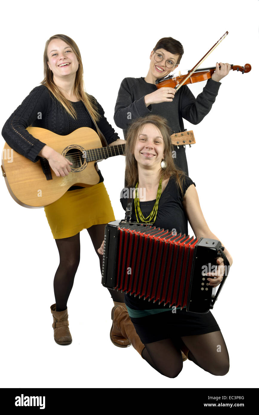 Gruppe von drei jungen Musikerinnen Stockfoto