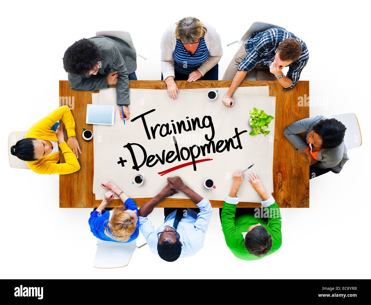 Personen in einem Meeting mit Ausbildungs- und Entwicklungskonzept Stockfoto